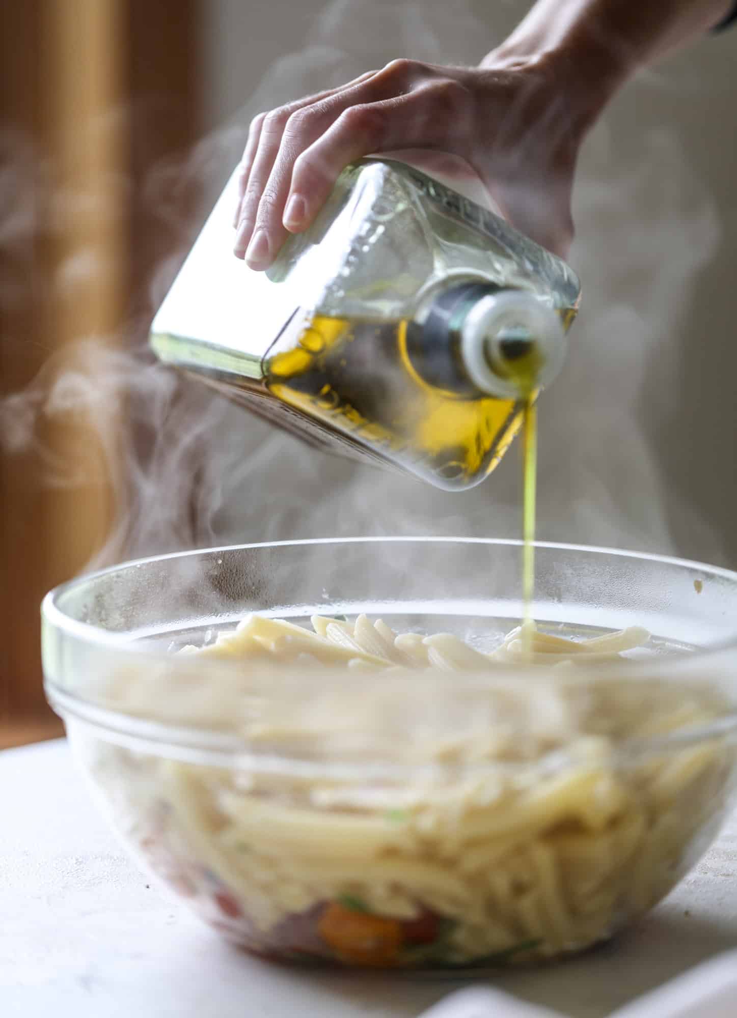 This bruschetta chicken is the perfect summer garden meal! Juicy, flavorful chicken topped with fresh tomatoes, garlic, basil and balsamic glaze, along with a touch of cheese. Served with pasta, it's an incredible meal. I howsweeteats.com #bruschetta #chicken #pasta #tomatoes #basil 