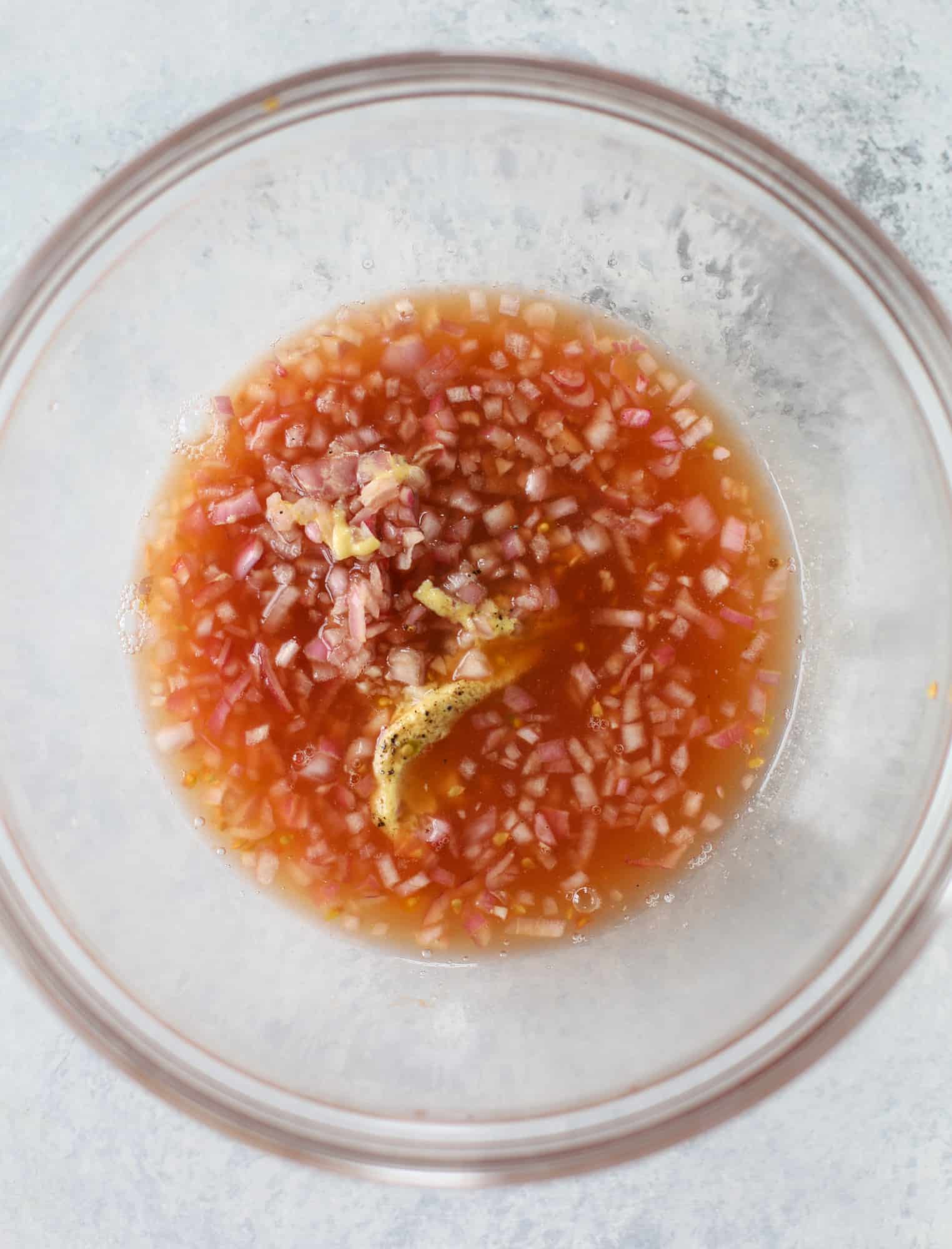 This is the perfect tomato panzanella salad! It's full of juicy, bursting, sweet tomatoes, toasted sourdough bread cubes, fresh herbs, grilled corn, sliced avocado and an incredible homemade dressing that blankets everything in deliciousness. SO good. I howsweeteats.com #panzanella #salad #tomato #basil #summer #corn #avocado #healthy #recipes