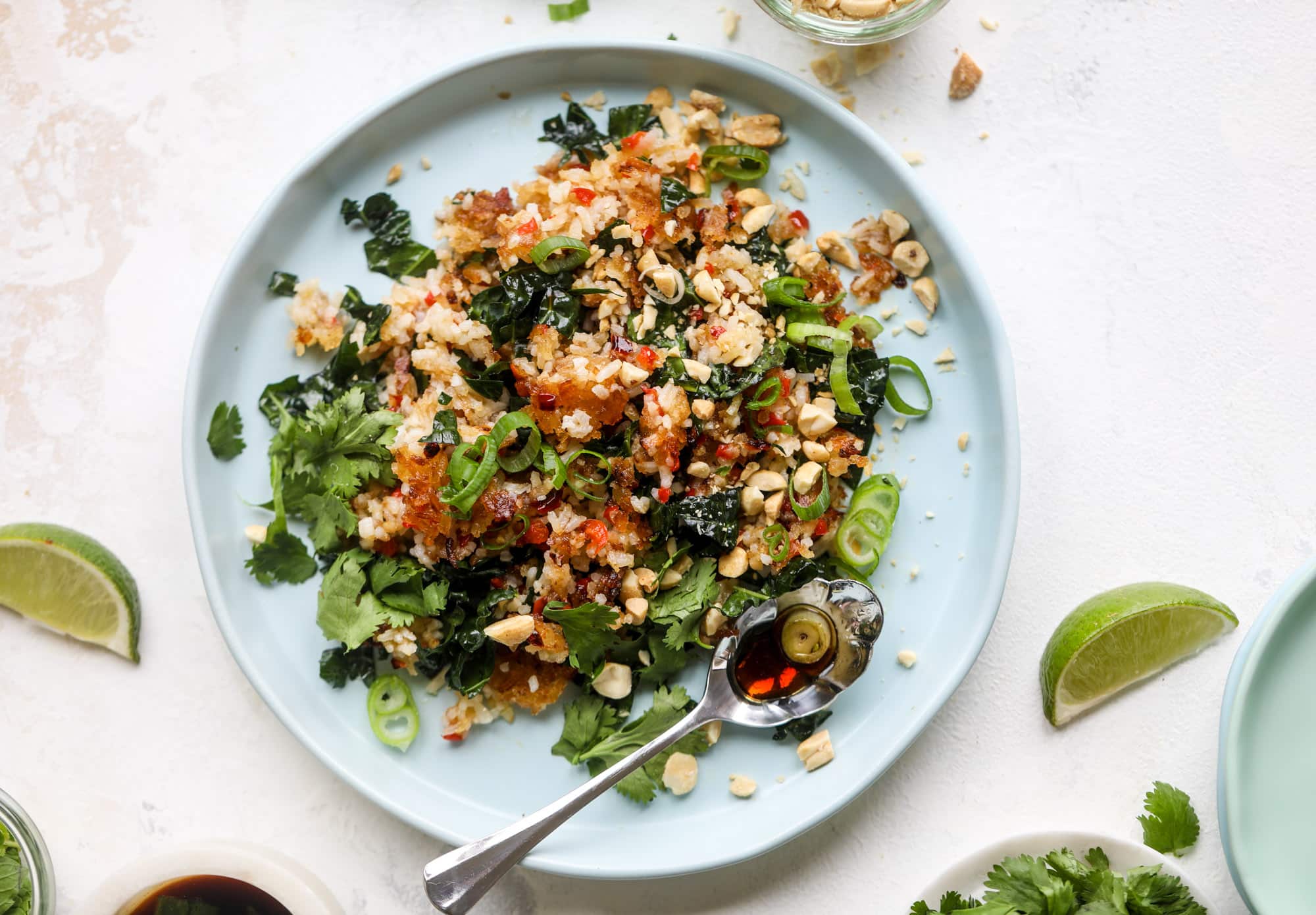 This crispy rice salad is the best lunch I've had in ages! It's full of crunch and crisp, it's satisfying and has lots of green kale so we get our veg in. The crispy rice salad can be a meal, you can add beans or rice or it can even be a side dish. I howsweeteats.com #rice #salad #vegetarian #crispy #kale
