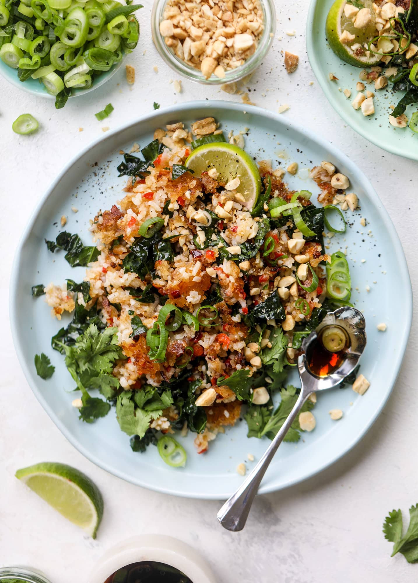 This crispy rice salad is the best lunch I've had in ages! It's full of crunch and crisp, it's satisfying and has lots of green kale so we get our veg in. The crispy rice salad can be a meal, you can add beans or rice or it can even be a side dish. I howsweeteats.com #rice #salad #vegetarian #crispy #kale
