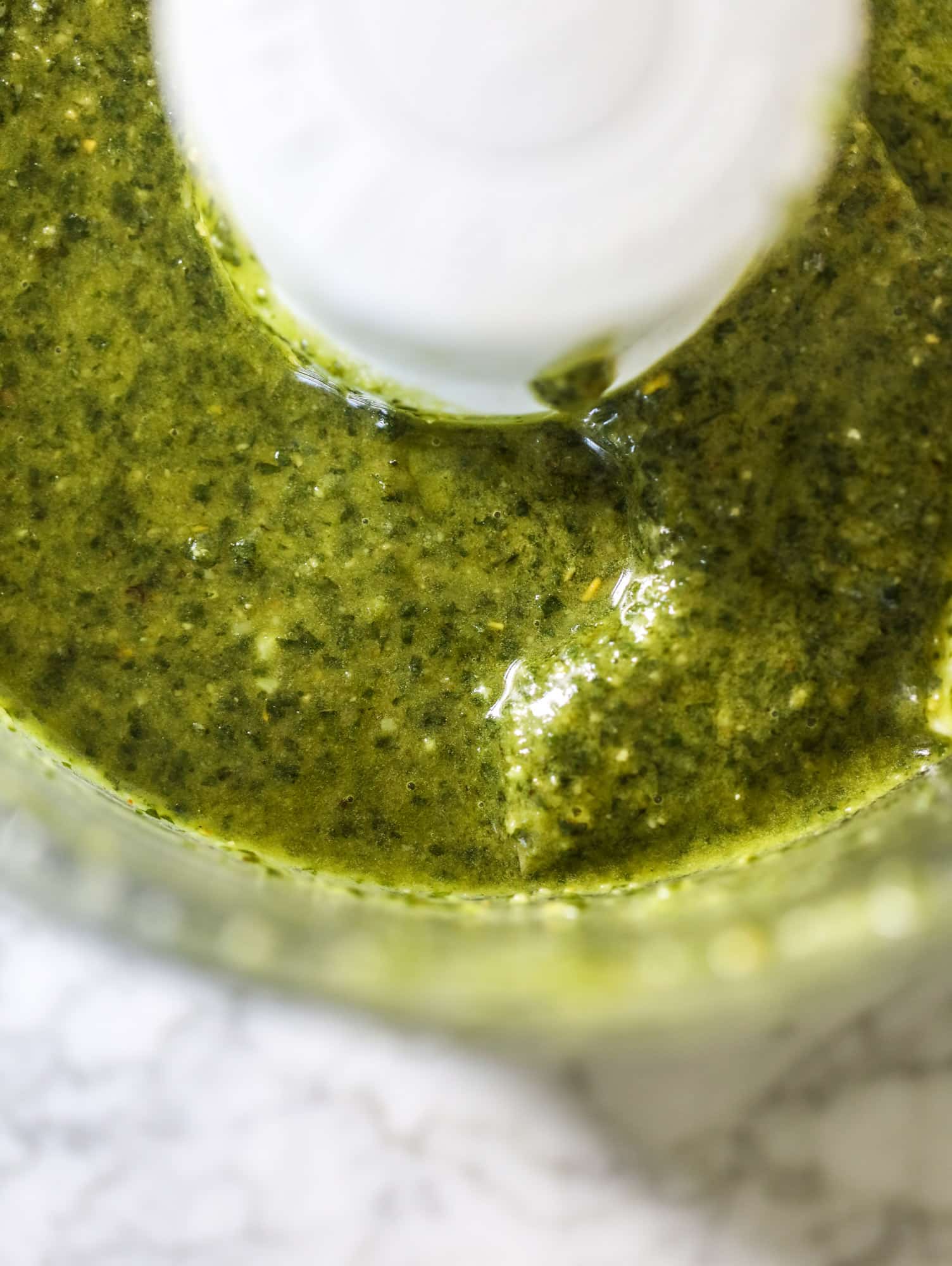 This ricotta jam jar is the perfect appetizer and snack to serve at a party! Based on the ricotta jam jar served at Nordstrom Cafe, it starts with creamy ricotta, is topped with flavorful basil pesto and a quick tomato jam. Serve with crunchy bread and dip dip dip! I howsweeteats.com #ricotta #jam #jar #nordstrom #tomato #pesto #appetizer #dip