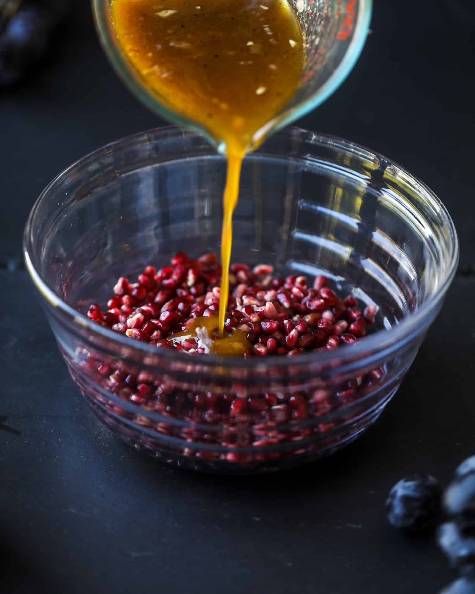 This is the perfect autumn harvest bruschetta board to feed a crowd or serve at a party! The standout is pomegranate relish with a cinnamon shallot vinaigrette, lots of toasty bread, bruschettas, cheese and olives. Everything that's delish! I howsweeteats.com #bruschetta #board