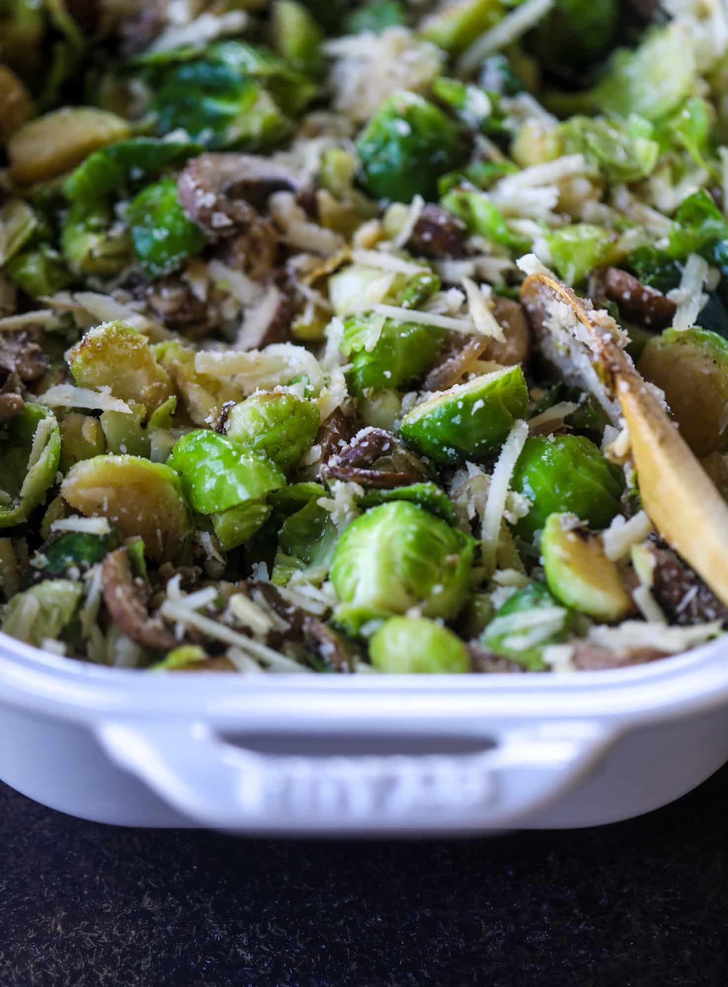 This brussels sprouts gratin is heaven in a dish! It's super flavorful, delicious and comes together to create a fabulous side dish for Thanksgiving or the holidays. Pancetta and cheese turn this in to flavor town - you won't be able to stop eating it! I howsweeteats.com #brusselssprouts #gratin