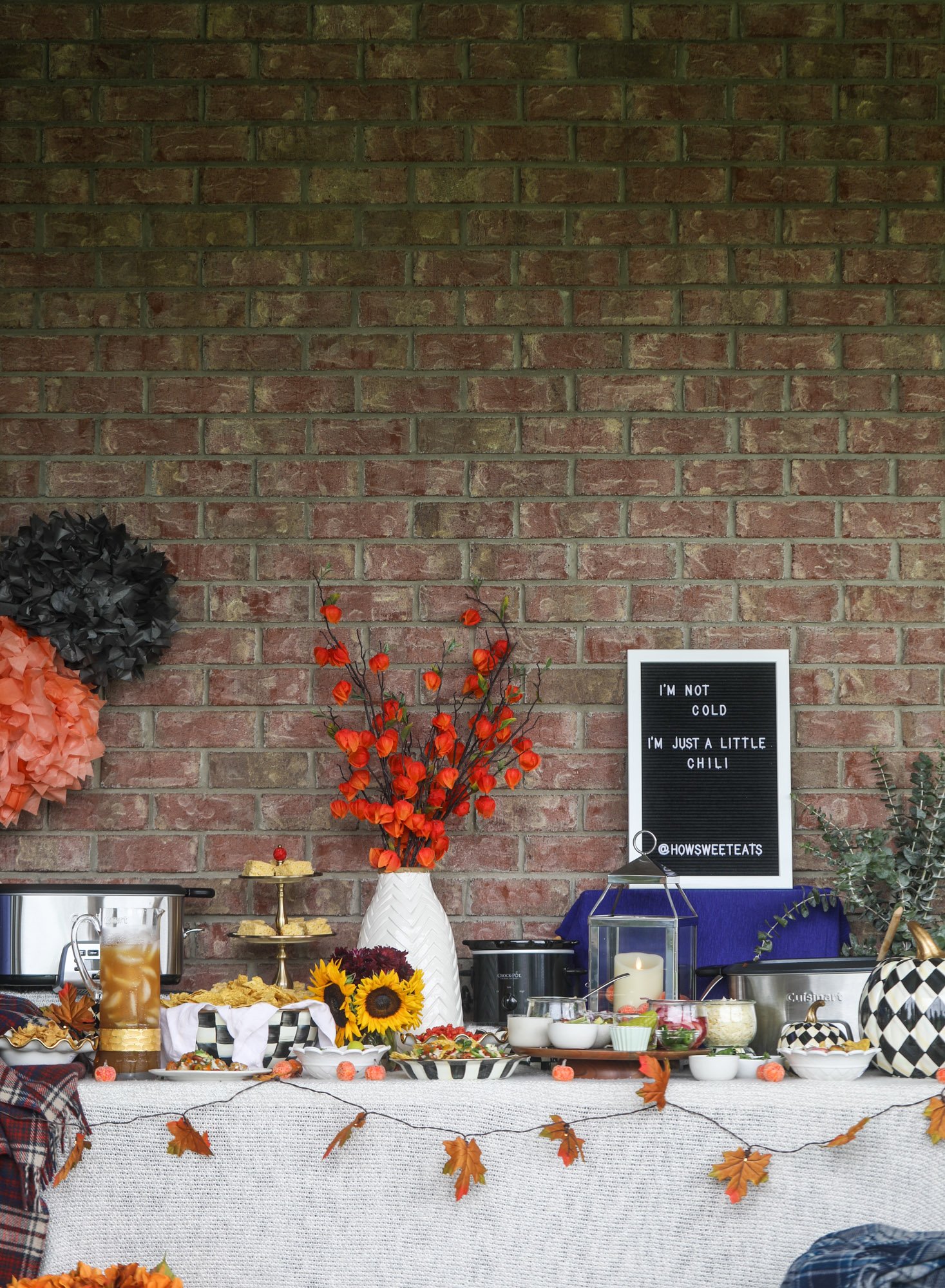 This is the best way to set up a chili bar! All my tips and tricks for setting up a perfect chili bar with multiple toppings, a nacho bar, hot dogs - all done with prep to make the day of the party super easy! This chili bar is goals. I howsweeteats.com #chili #bar #how #to