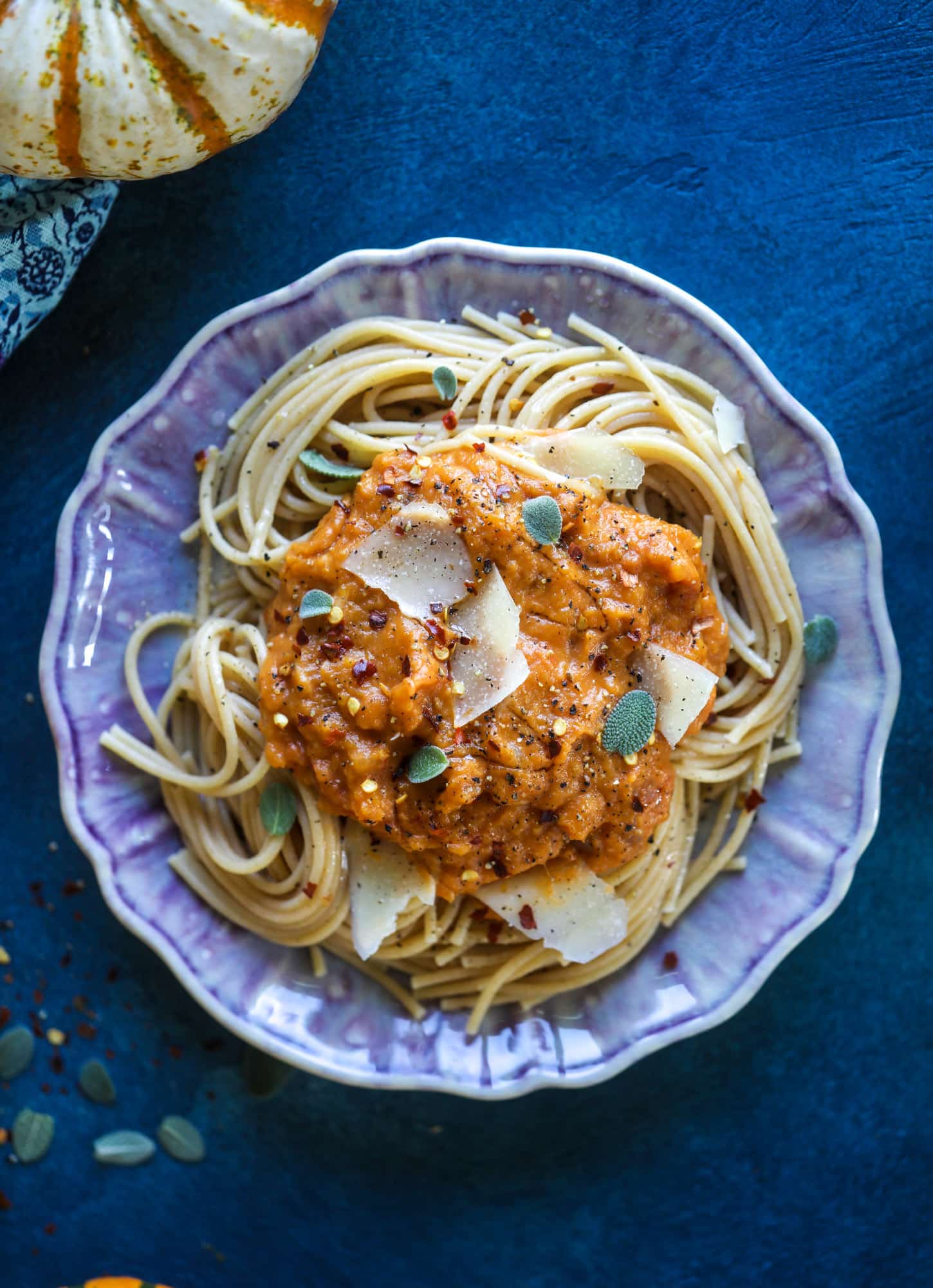This butternut squash pasta sauce is heaven for an October dinner! Fire roasted tomatoes, butternut squash, pumpkin, sage, spice and parmesan all come together to create a delicious, simmered pot of sauce to blanket your favorite pasta! I howsweeteats.com #butternut #squash #pasta #sauce