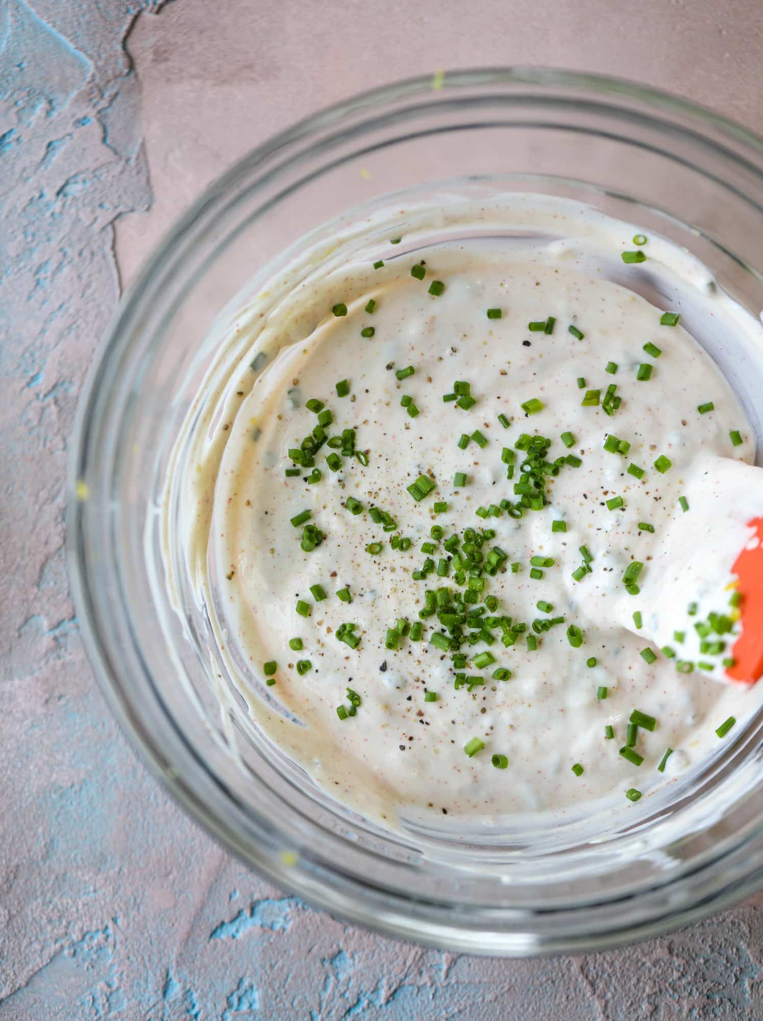 This yogurt marinated chicken recipe is super flavorful, tender, juicy and delicious. The fresh lemon adds a kick of flavor and it's a versatile recipe you can make for lunch or dinner. Grill it and serve with your favorite side, then use the leftovers for lunch! I howsweeteats.com #yogurt #chicken #lemon #grilled #healthy #recipes