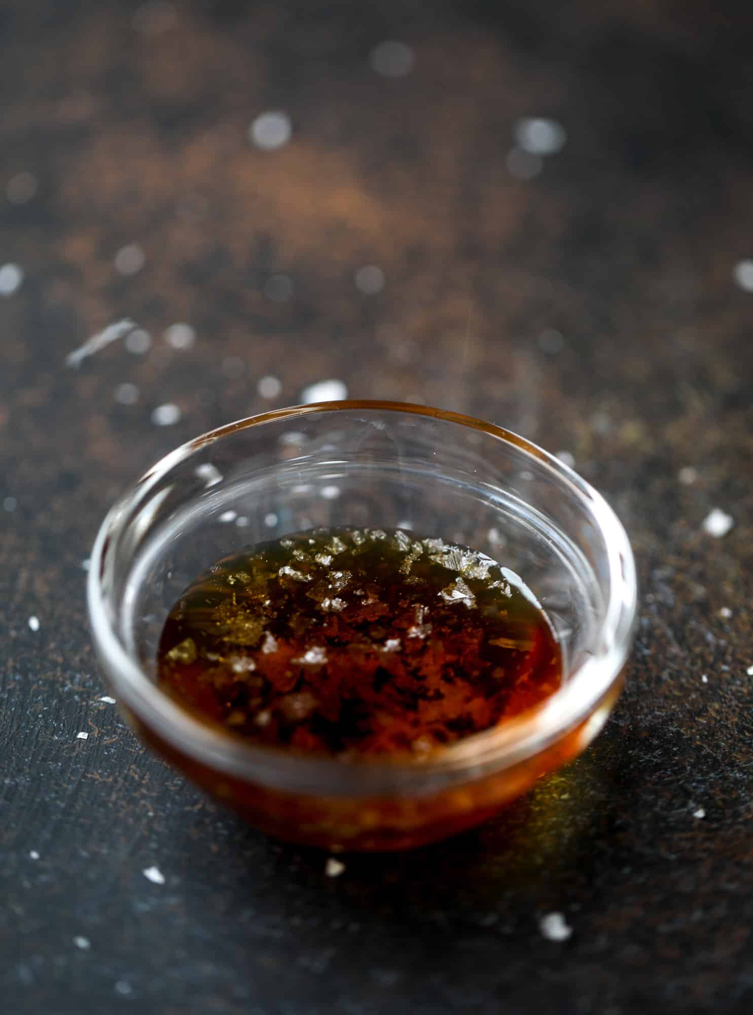 This salted maple power coffee is the perfect creamy pick-me up. Maple syrup, coconut butter and sea salt are blended with hot coffee to make the most deliciously whipped hot, frothy latte-like drink, without any dairy! I howsweeteats.com #coffee #coconutbutter