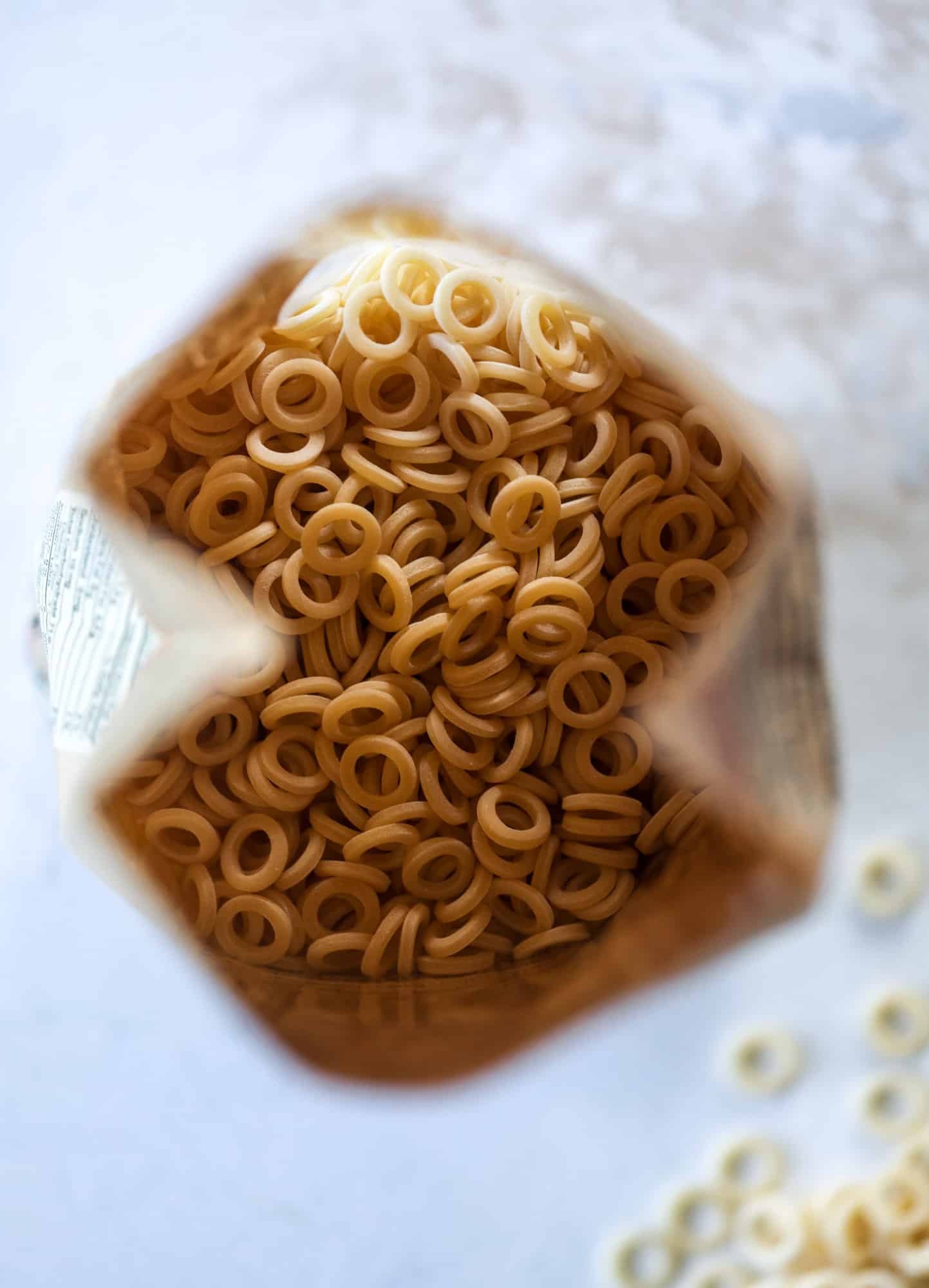 These homemade spaghettios are the ultimate comfort food! They come together in less than 30 minutes, are super easy and flavorful and topped with crispy crunchy manchego cheese that takes the taste over the top! I howsweeteats.com #homemade #spaghettios