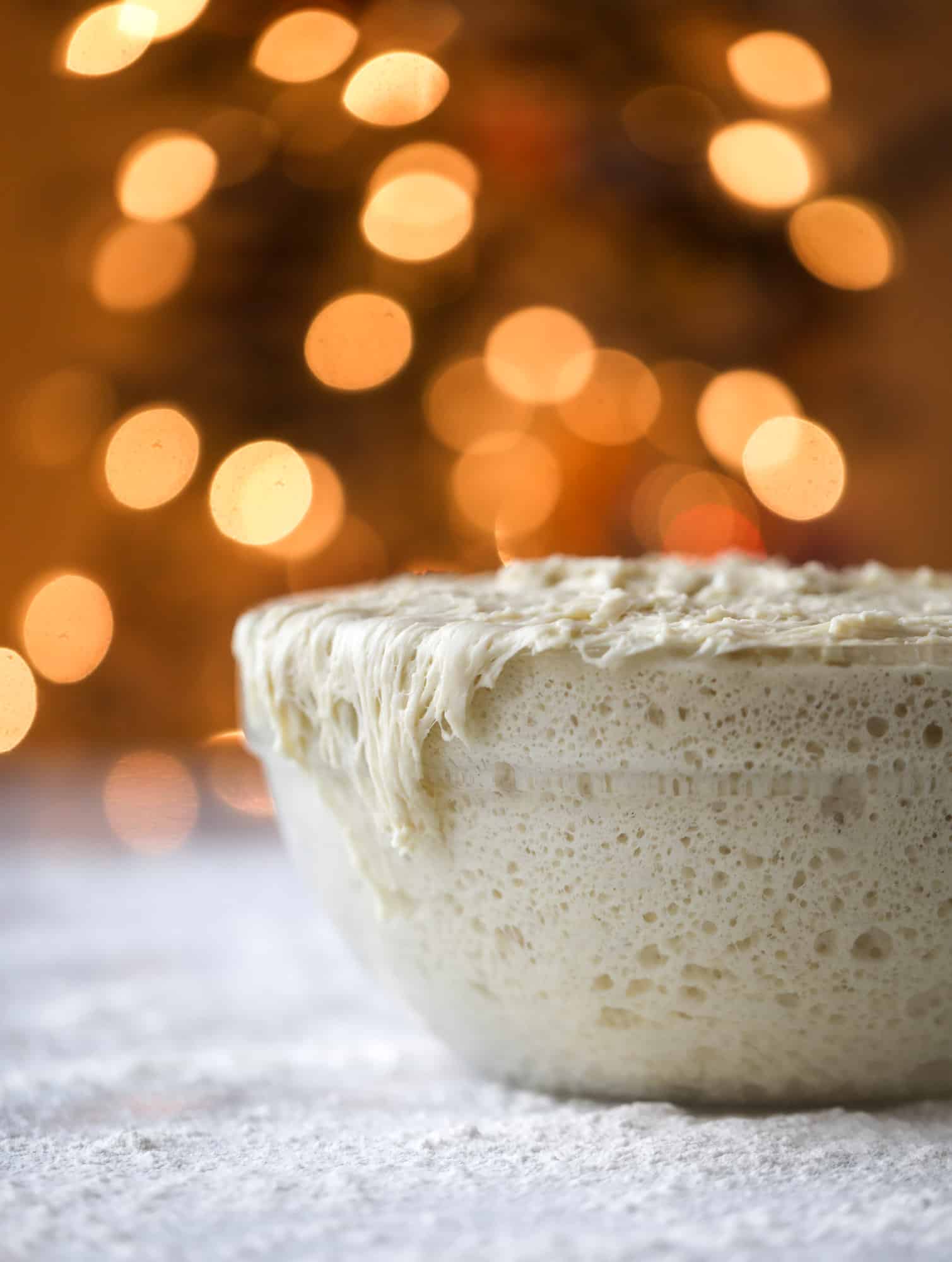 These white chocolate cranberry sticky buns are what holiday dreams are made of! Made in a muffin tin with fresh cranberries and creamy white chocolate, they are drizzled with cranberry caramel too! Dreamy! I howsweeteats.com #sticky #buns