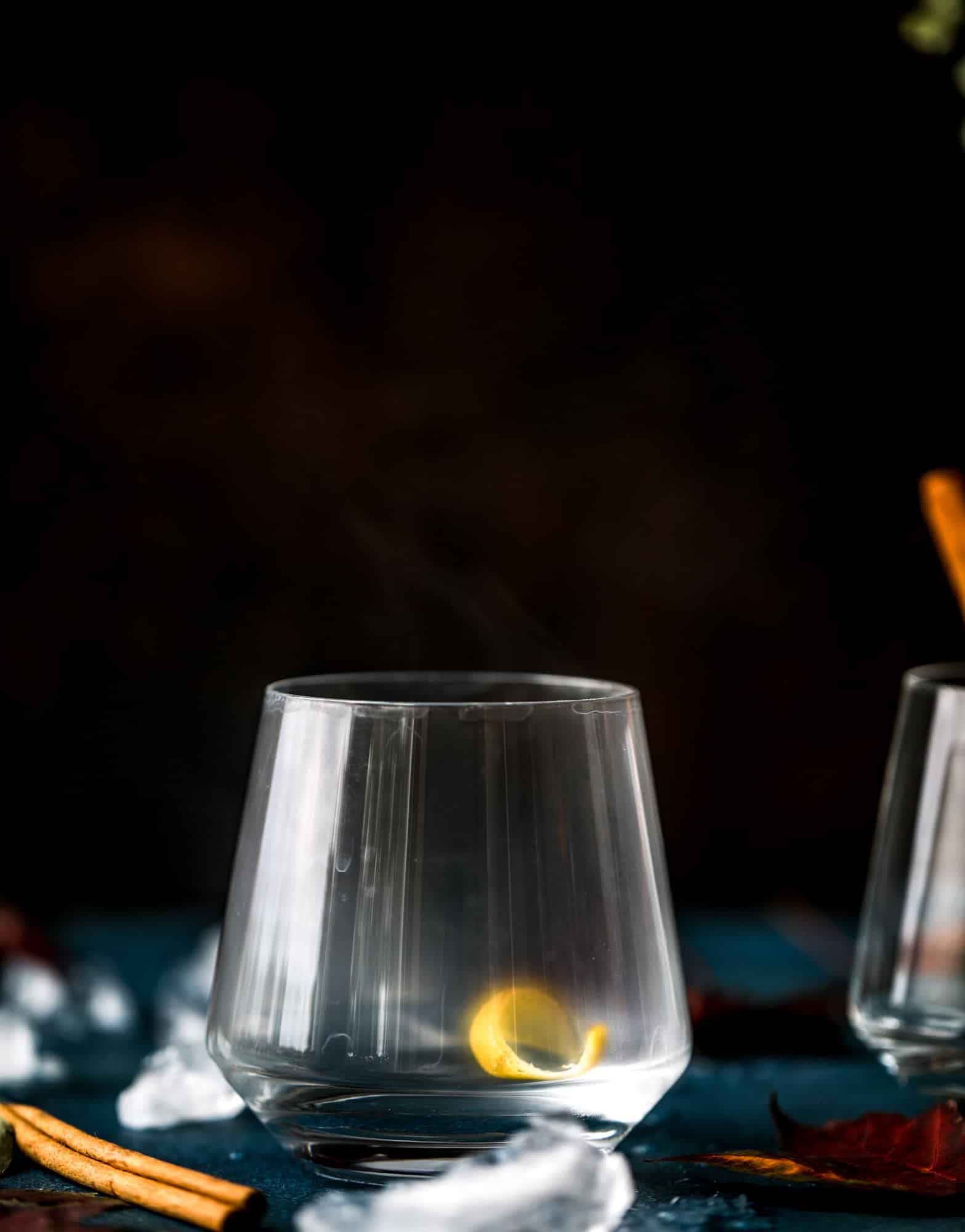 This smoked maple old fashioned cocktail is the perfect smoky drink for fall and winter. It's warming and filled with amazing flavor, using smoked maple bourbon and pure maple syrup. Delicious! I #maple #oldfashioned