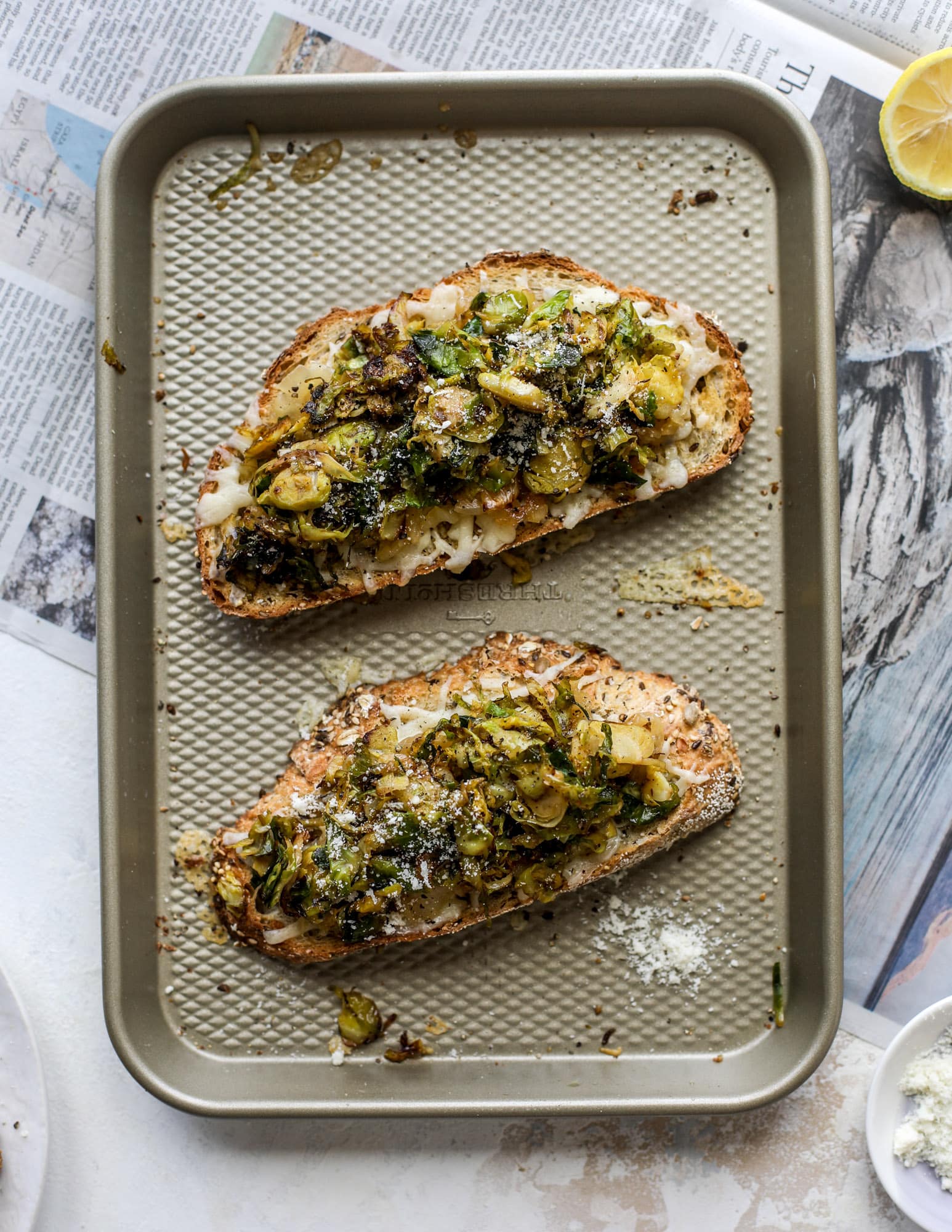 Crispy brussels sprouts toast begins with sourdough bread, melty havarti cheese and caramelized onions. It's high-maintenance toast in the best way possible. I howsweeteats.com