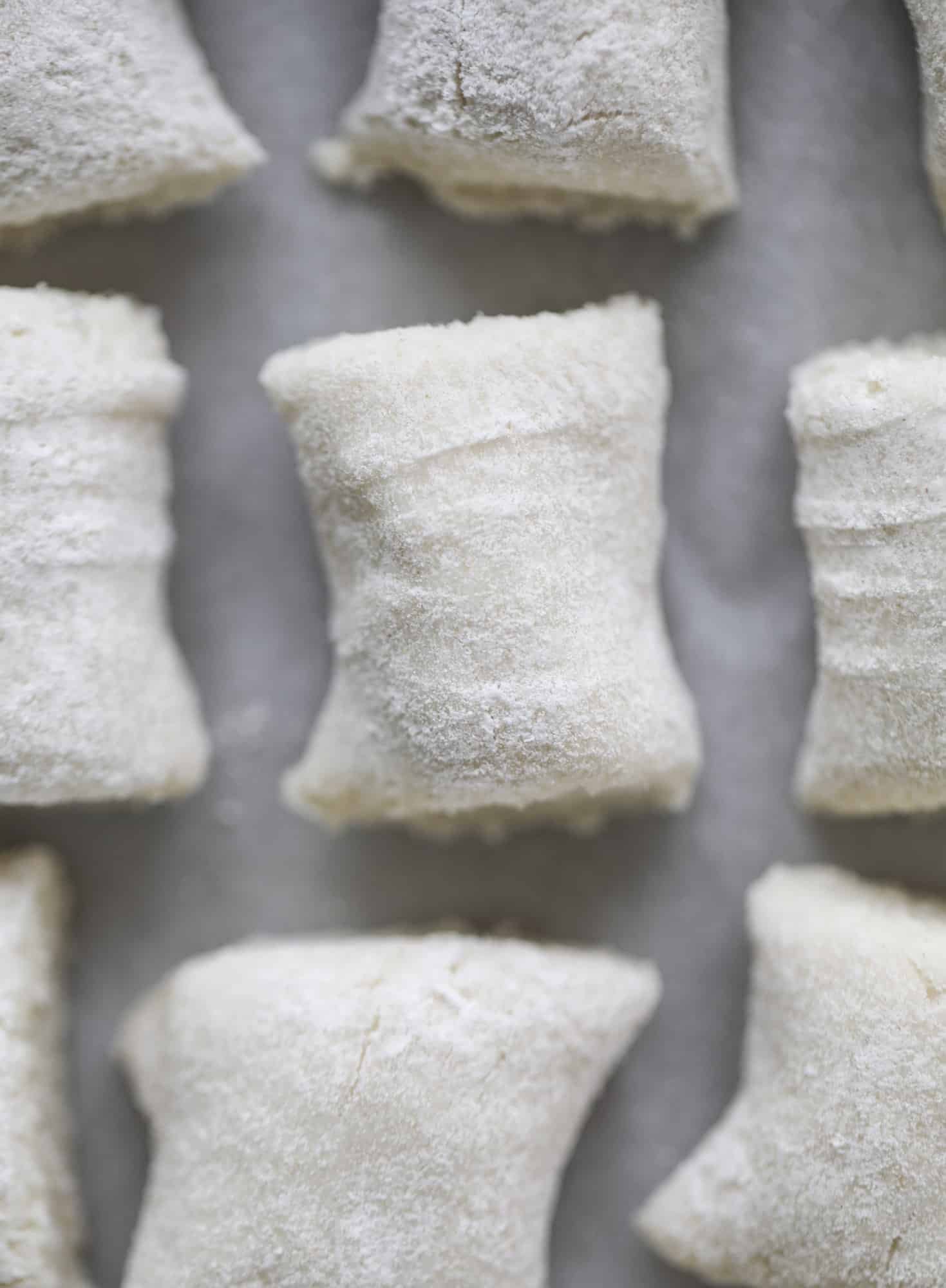 Homemade cauliflower gnocchi that tastes just like the Trader Joe's version! It's made with cauliflower, comes together fast and is super easy! I howsweeteats.com #cauliflower #gnocchi