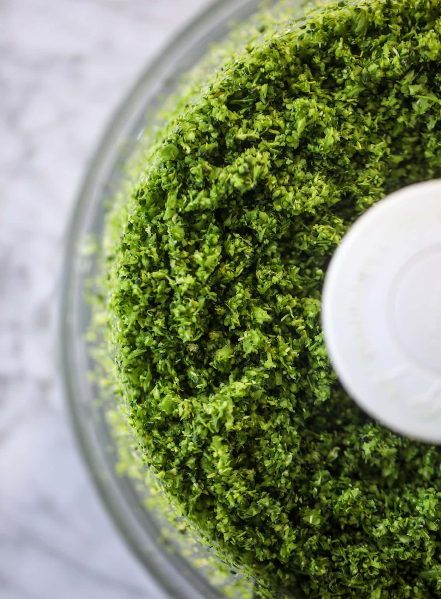 These broccoli cheddar tots are baked, crispy bites of broccoli and sharp cheddar cheese! So delicious and easy to throw together too. I howsweeteats.com #broccolicheddar #tots