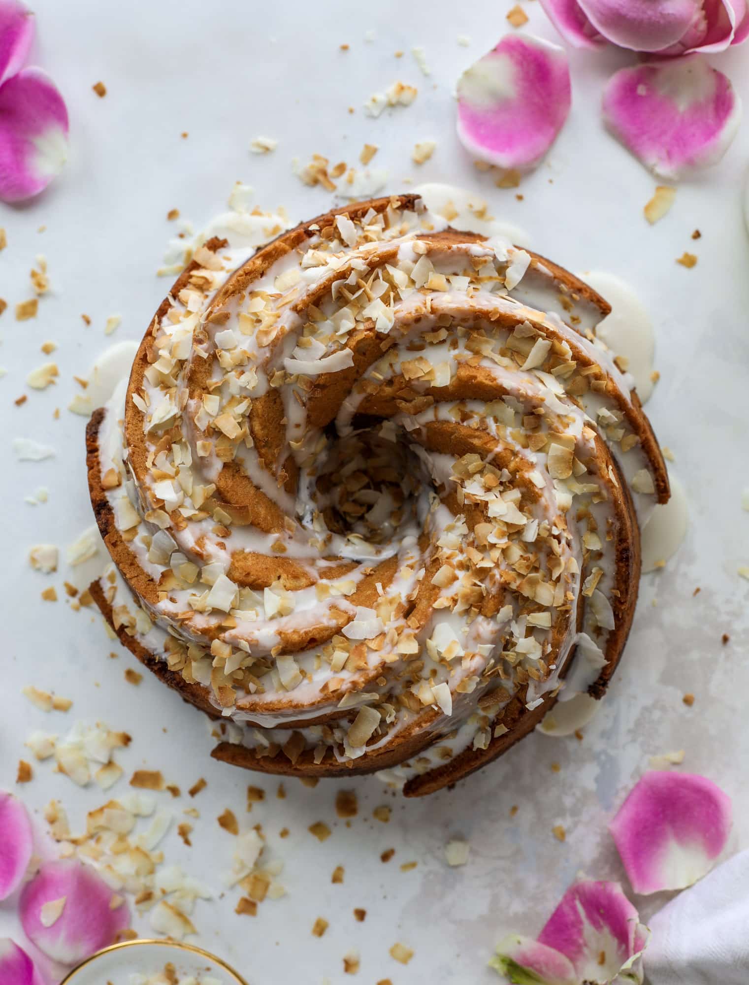 Make breakfast and brunch better with coconut coffee cake! Tender coconut cake with a cocoa sugar streusel and a coconut glaze. To die for!