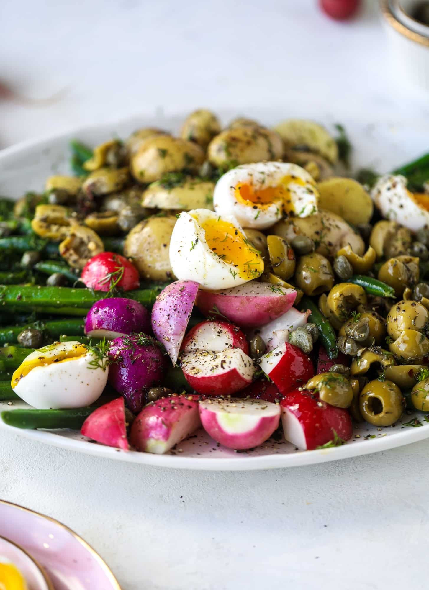 soft boiled eggs on a perfect spring salad