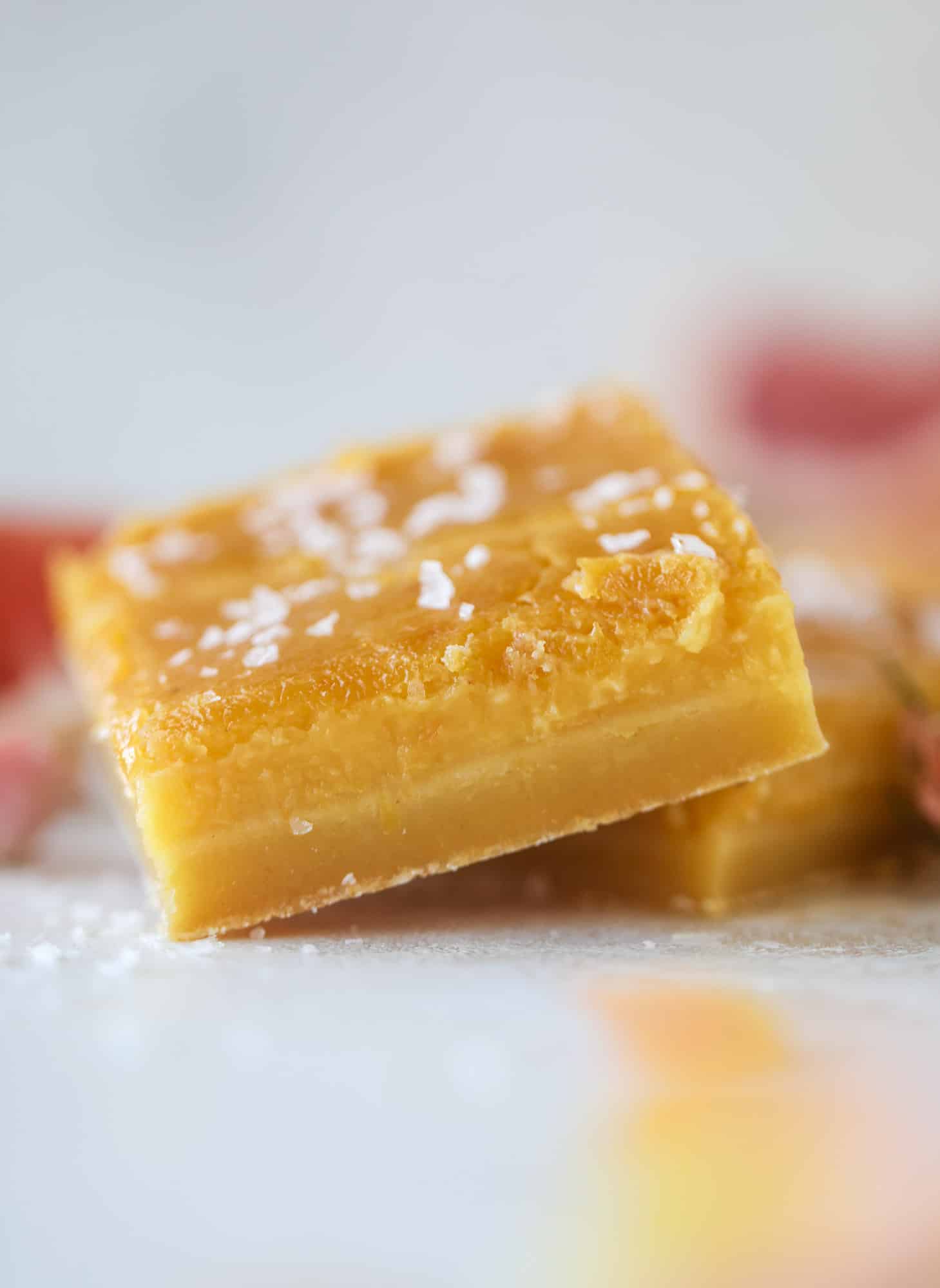 These salted citrus bars are made of both grapefruit and lemon curd on a buttery shortbread crust. Top with flaked sea salt for the perfect bite!