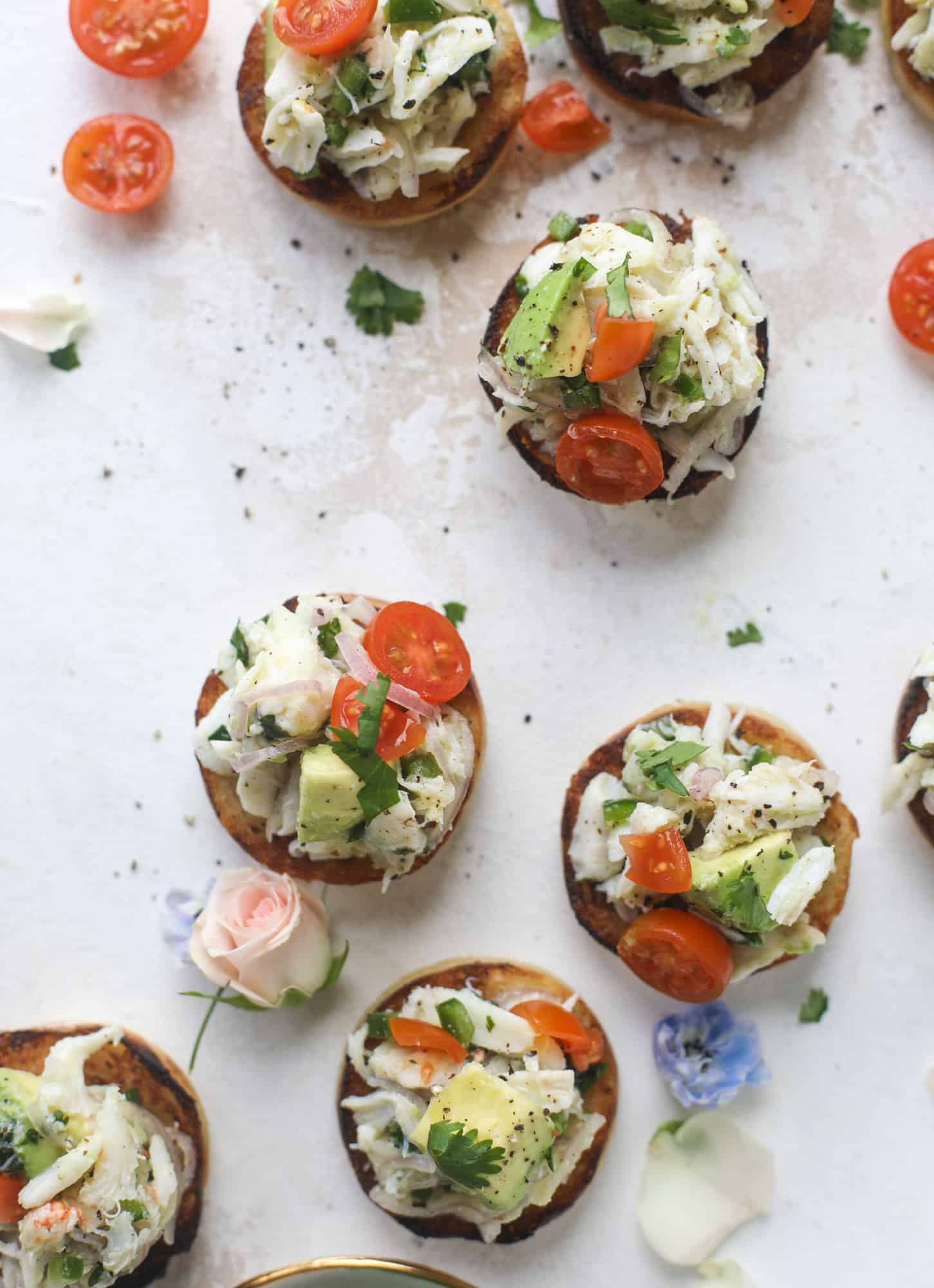 The cutest crab salad toasts are perfect for a snack, appetizer or light meal with a greens salad. This avocado crab salad is so refreshing and light!