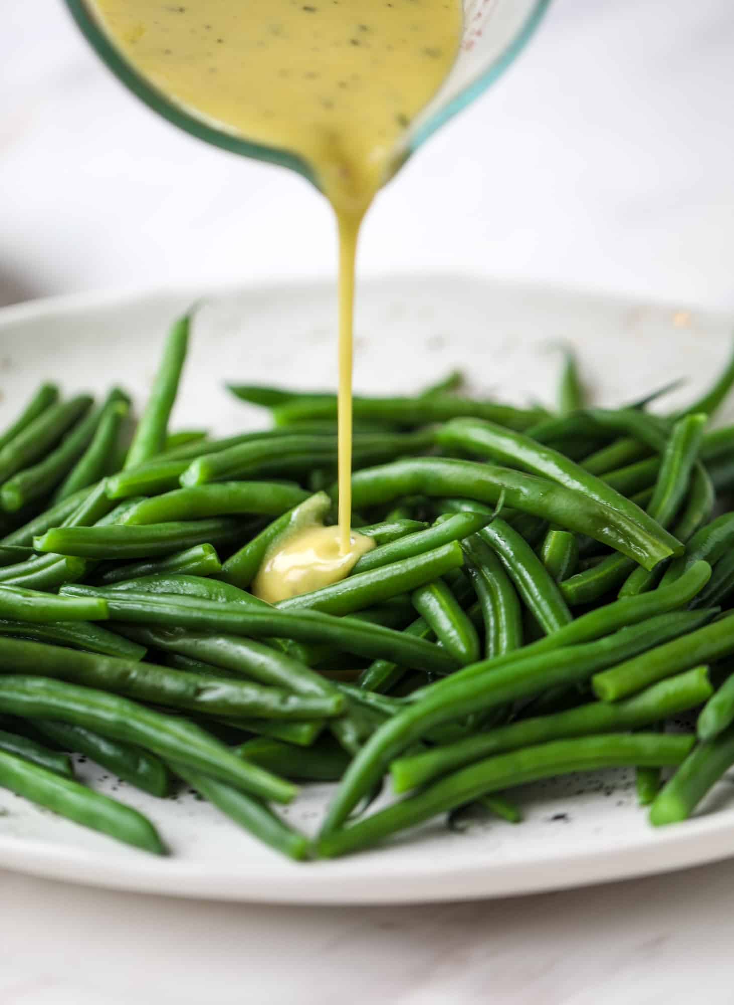 dijon vinaigrette on blanched green beans
