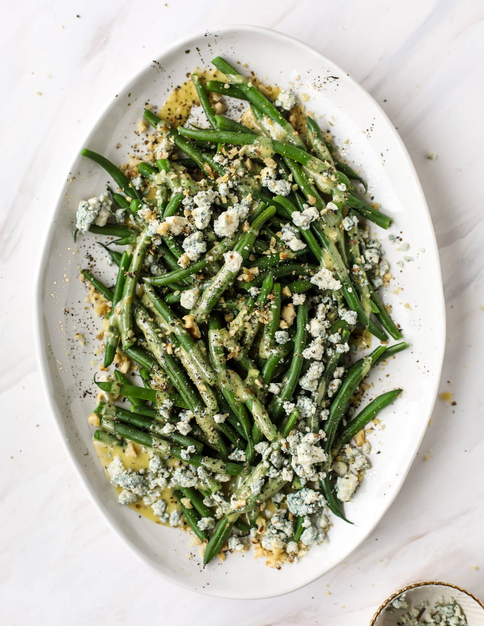 This fresh green bean salad is the ultimate summer side dish. Crisp green beans, creamy blue cheese, chopped walnuts and a dijon dressing. It's beyond!