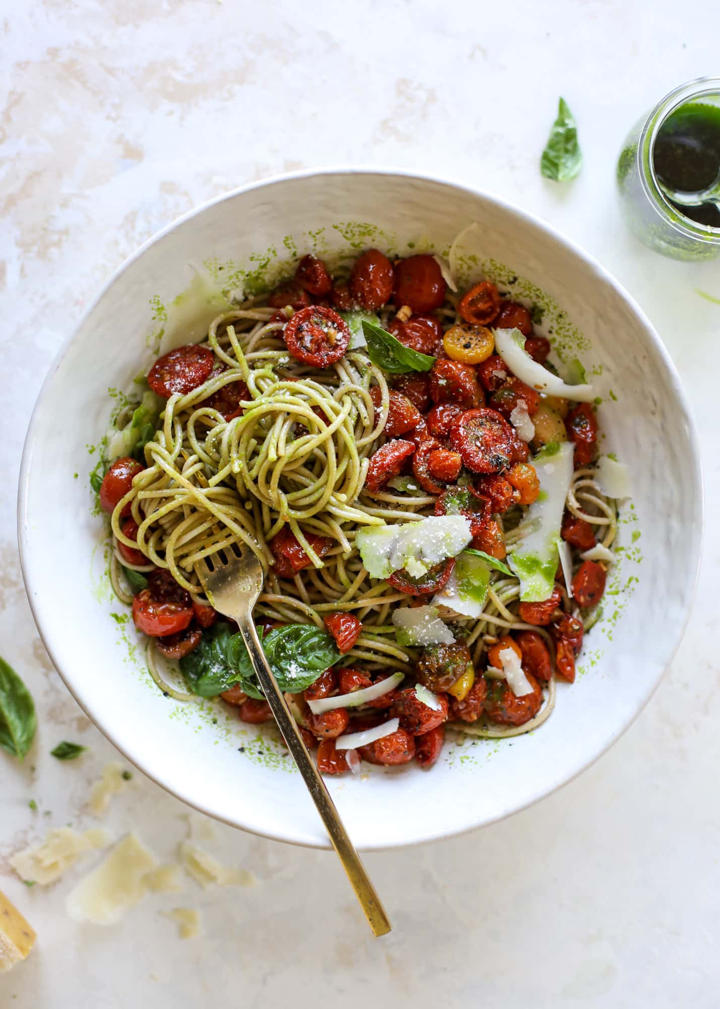 This tomato basil pasta is a labor of love! Made with slow roasted tomatoes, basil oil and tons of parmesan, it's ridiculously full of flavor.