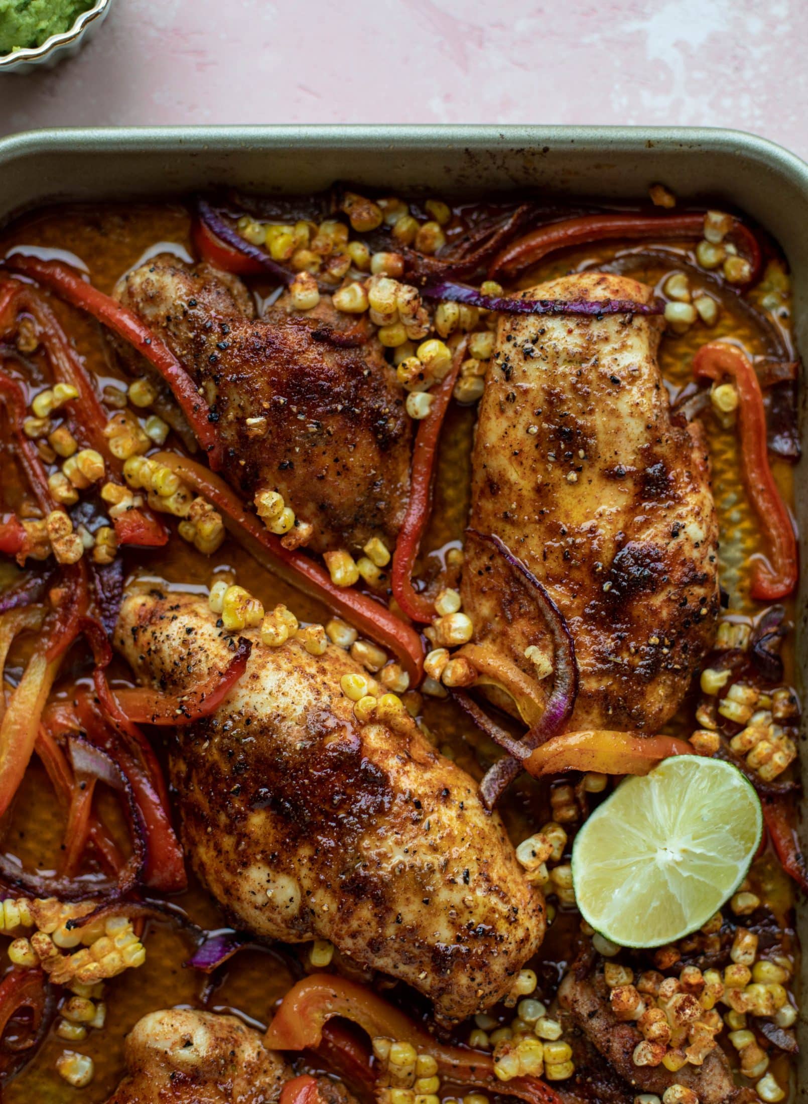 This sheet pan nacho chicken recipe results in the juiciest, more flavorful chicken that can be served in a multitude of ways!