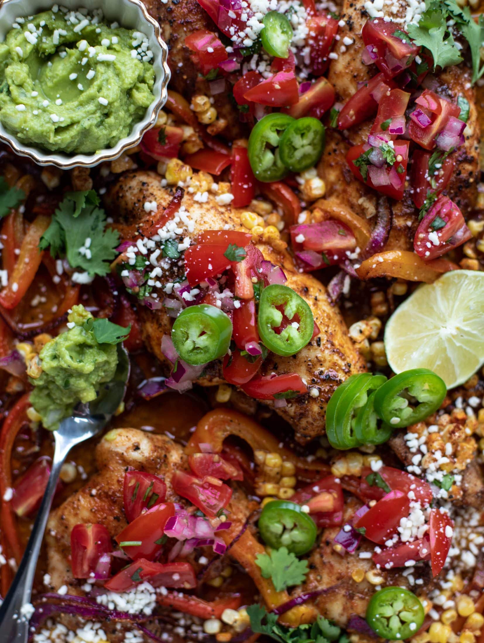 This sheet pan nacho chicken recipe results in the juiciest, more flavorful chicken that can be served in a multitude of ways!