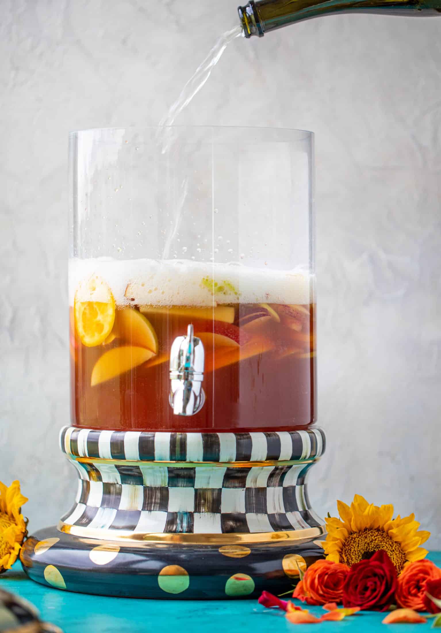 This apple cider punch recipe has tons of fall flavor! Apple cider, aperol, pomegranate soda and prosecco come together to create a bubbly treat!