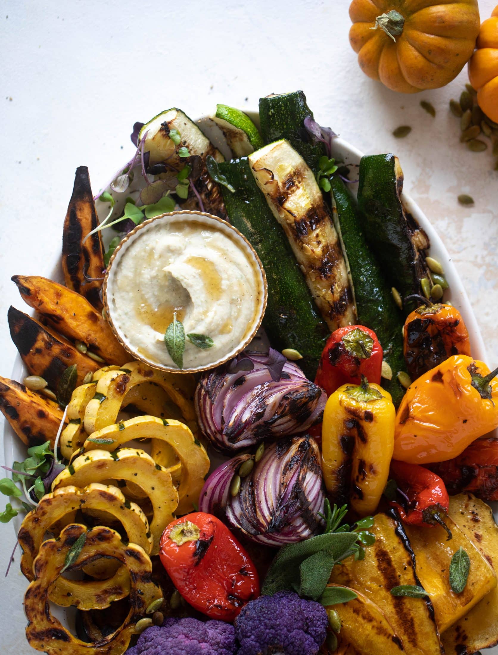 These grilled autumn vegetables make the best side dish or appetizer! Especially when served with the sage brown butter white bean dip. YUM.