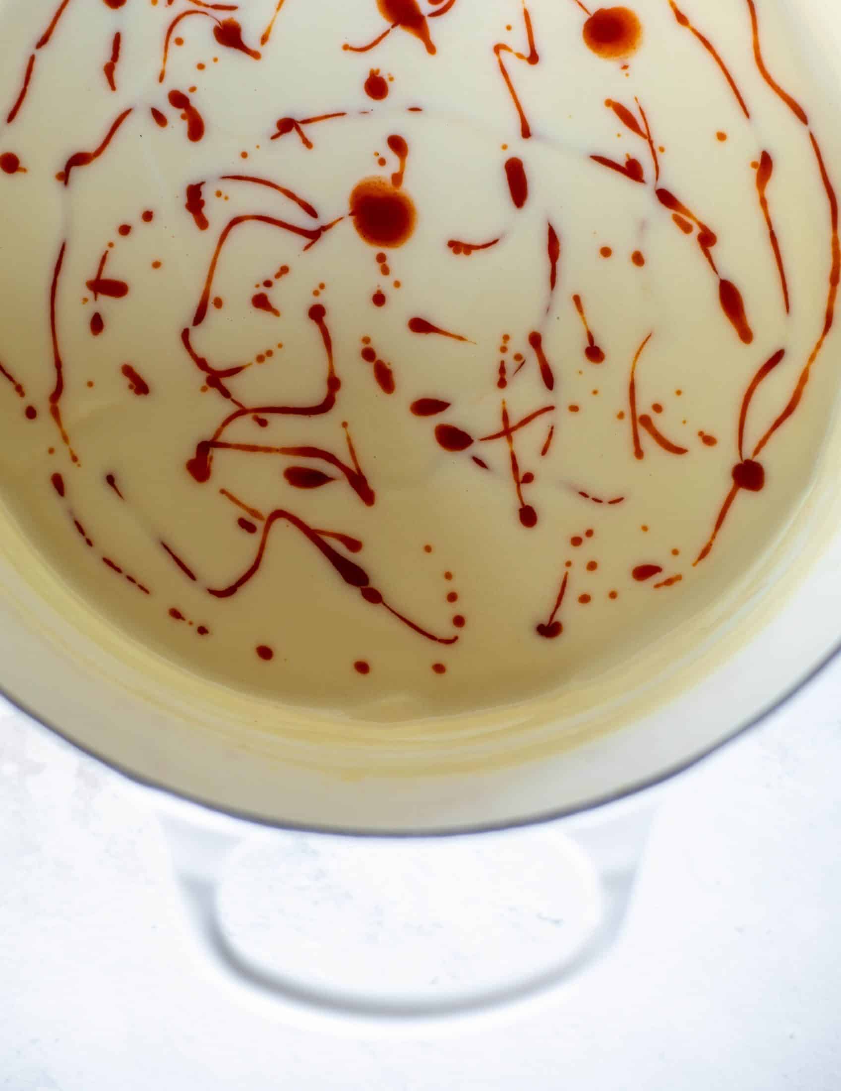 This buffalo cauliflower soup is creamy and decadent and silky smooth! Made with cheddar, wing sauce, blue cheese and all the fixins! 