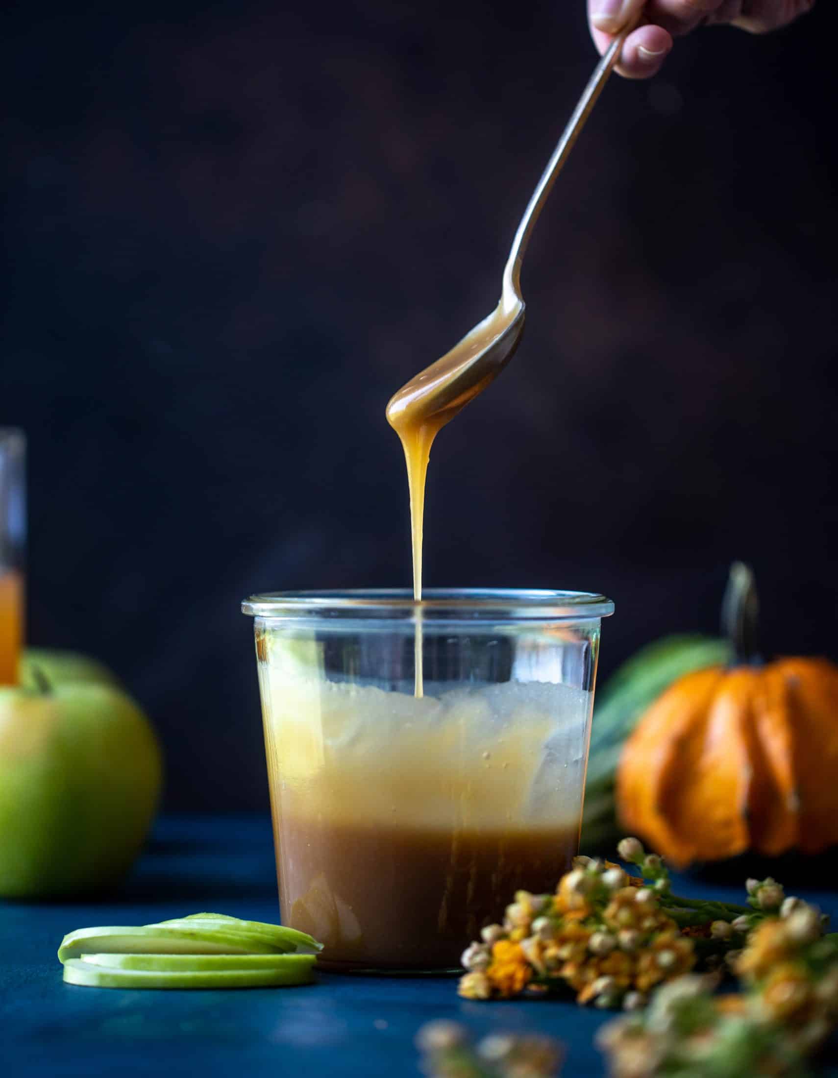 This caramel apple old fashioned will warm you up this fall! Bourbon, homemade cider caramel, apple cider and bitters make this super delish.