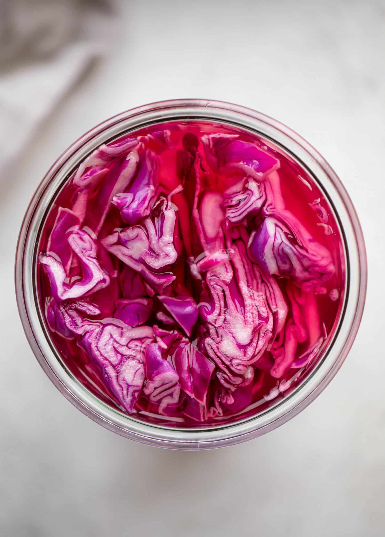 These cauliflower schnitzel sandwiches are full of flavor! Crispy cauliflower, caramelized onion mayo, pickled cabbage and microgreens. Delish!