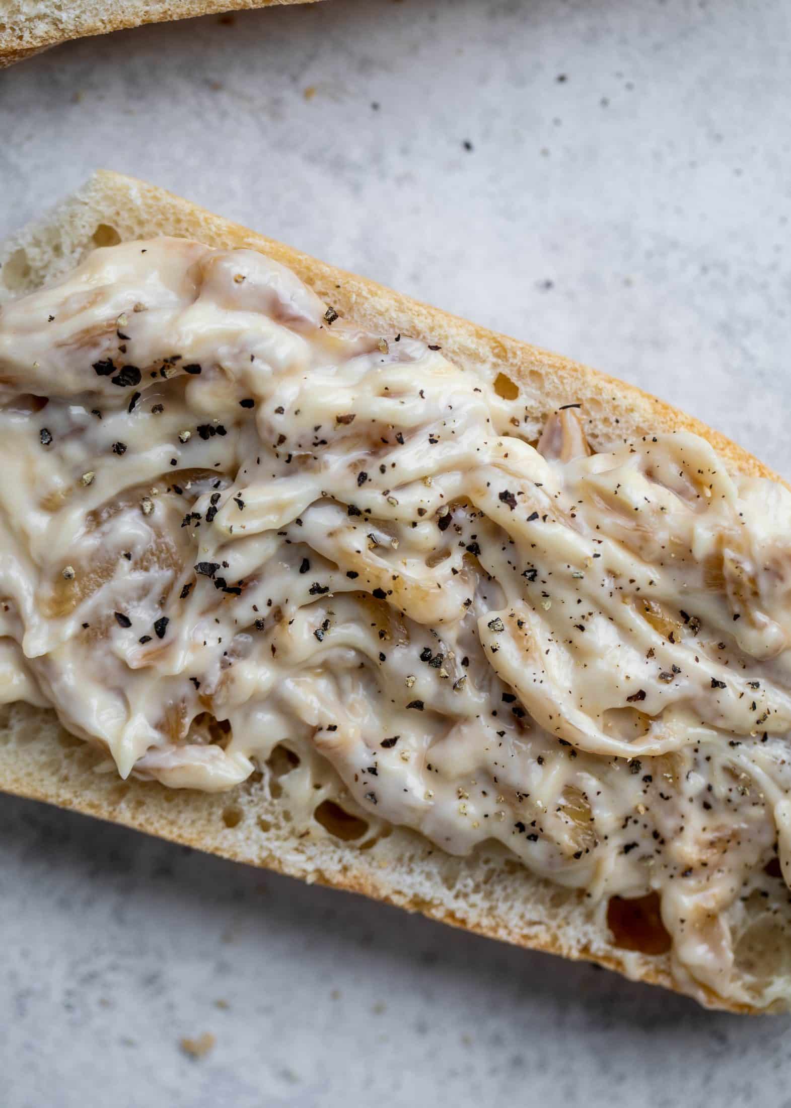 These cauliflower schnitzel sandwiches are full of flavor! Crispy cauliflower, caramelized onion mayo, pickled cabbage and microgreens. Delish!