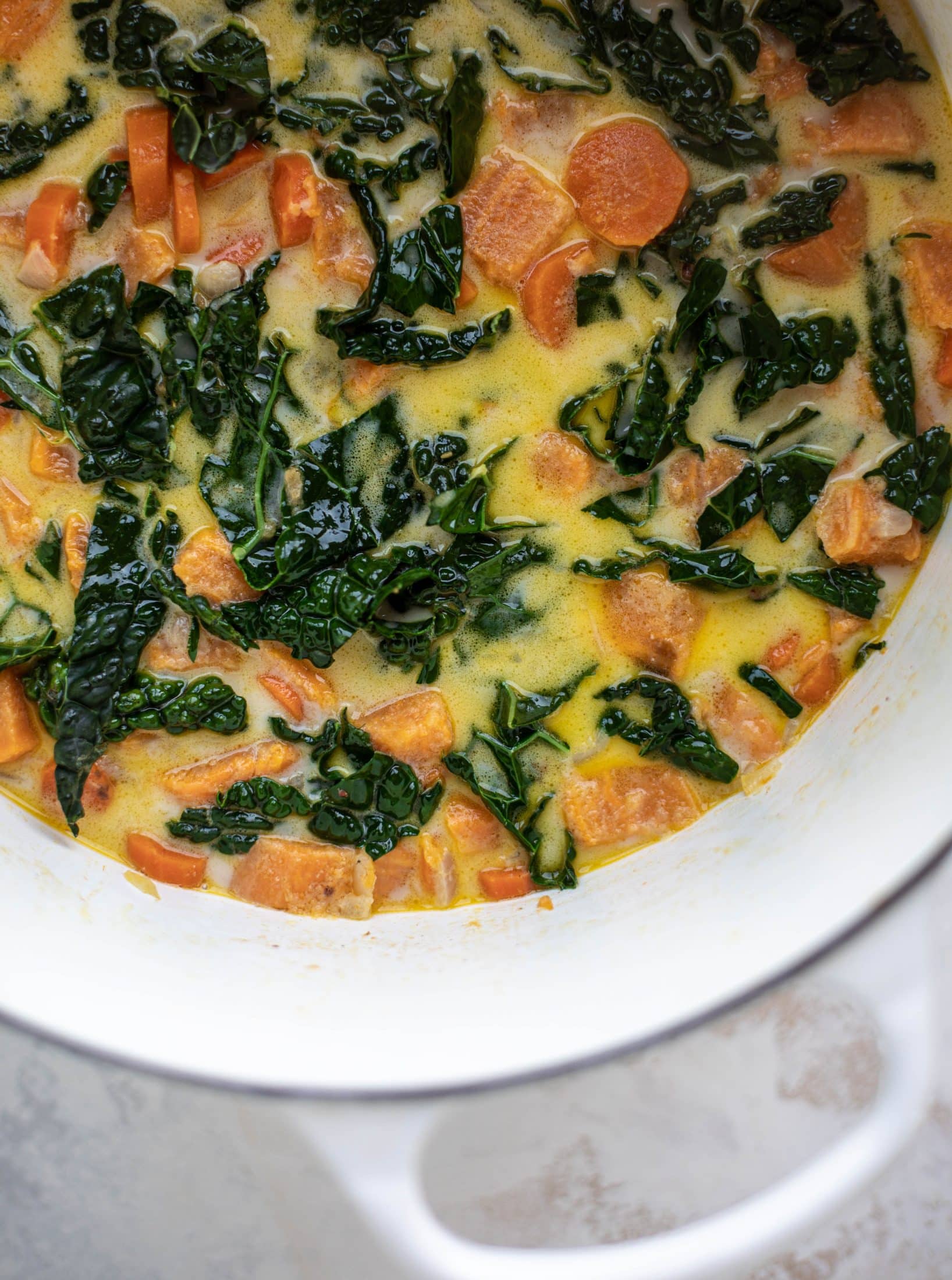 This sweet potato chowder is a hug in a bowl! Made with lots of greens and crunchy pancetta and pepitas for topping, it's a perfect weeknight meal.