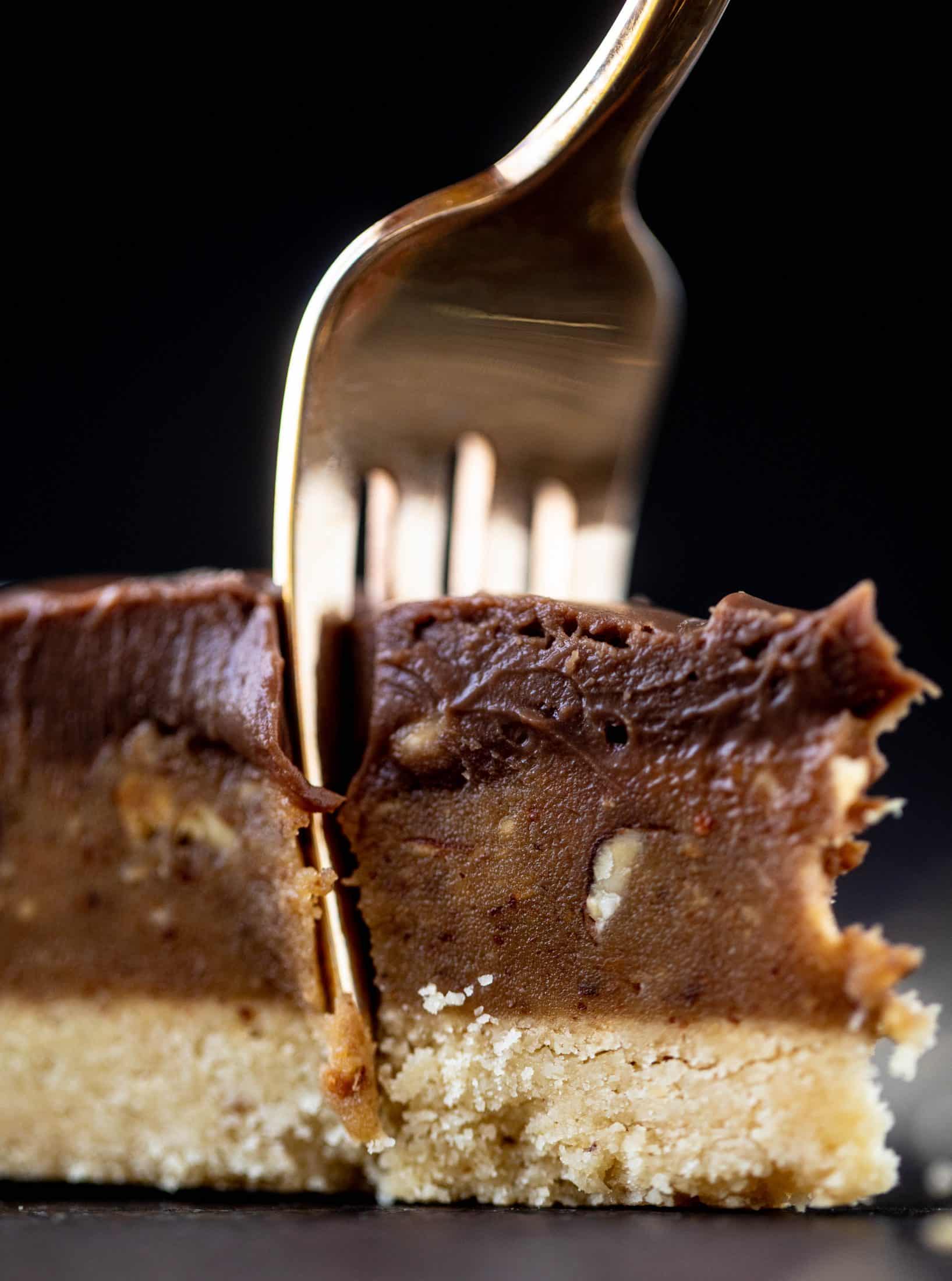 This snickers almond tart is made with an almond crust, homemade almond butter caramel and a chocolate ganache. It's to die for!