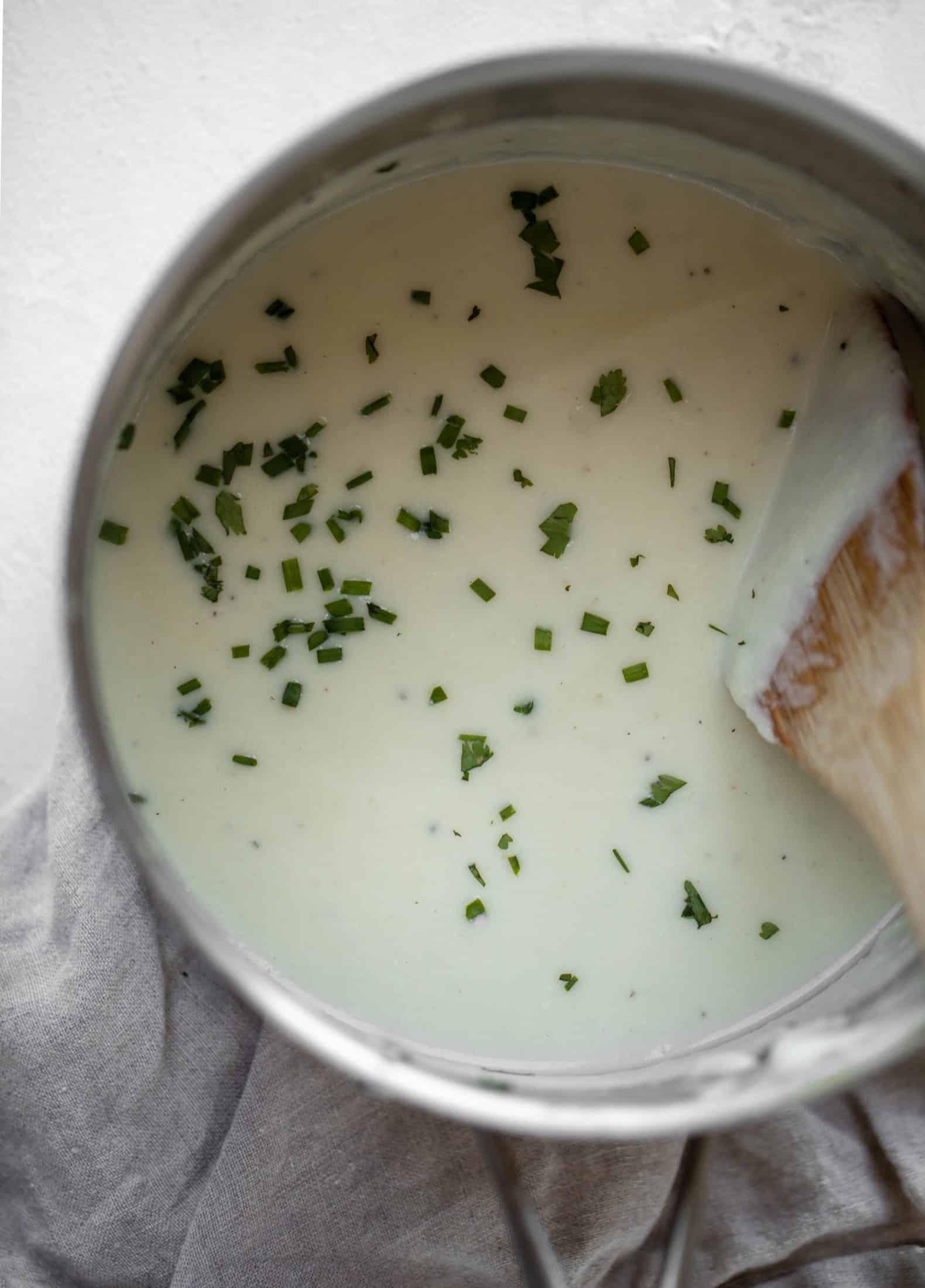 This bacon grilled cheese is filled with sharp cheddar and candied jalapeños! Served alongside a soup dipped for the ultimate comforting meal. 