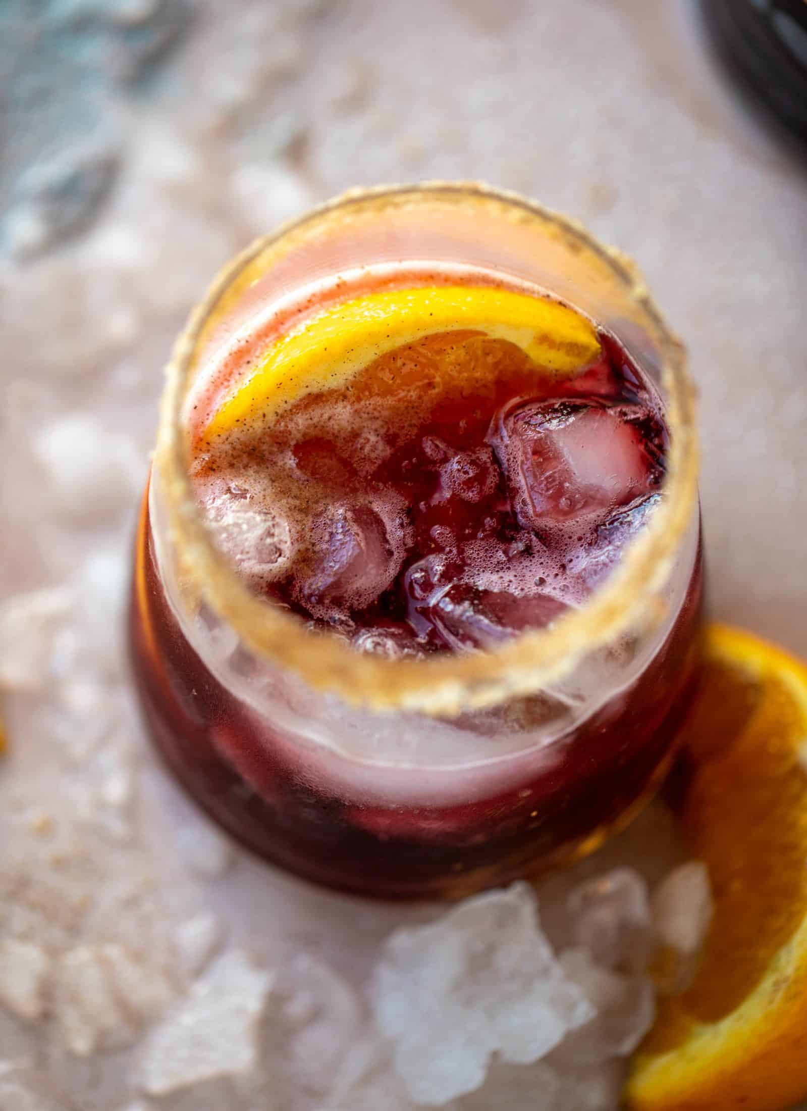 A refreshing and warming lambrusco smash, made with bubbly red wine, bourbon, orange soda and maple syrup. Tastes like the holidays!