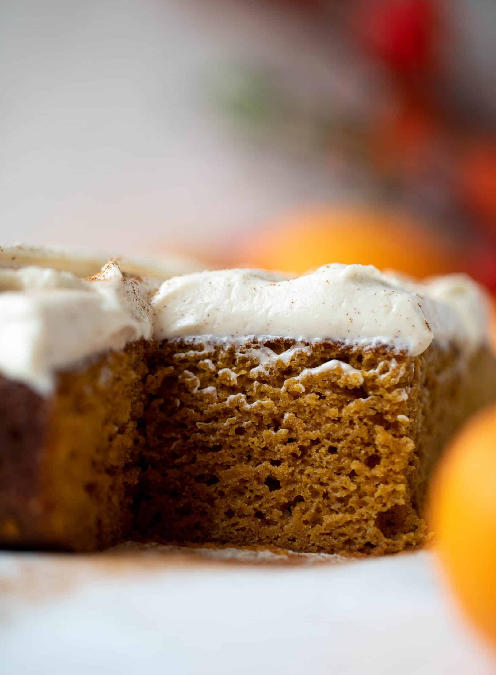 This pumpkin sheet cake is a legit pumpkin dream cake! It's so moist and fluffy and flavorful. With a blanket of cinnamon cream cheese frosting!