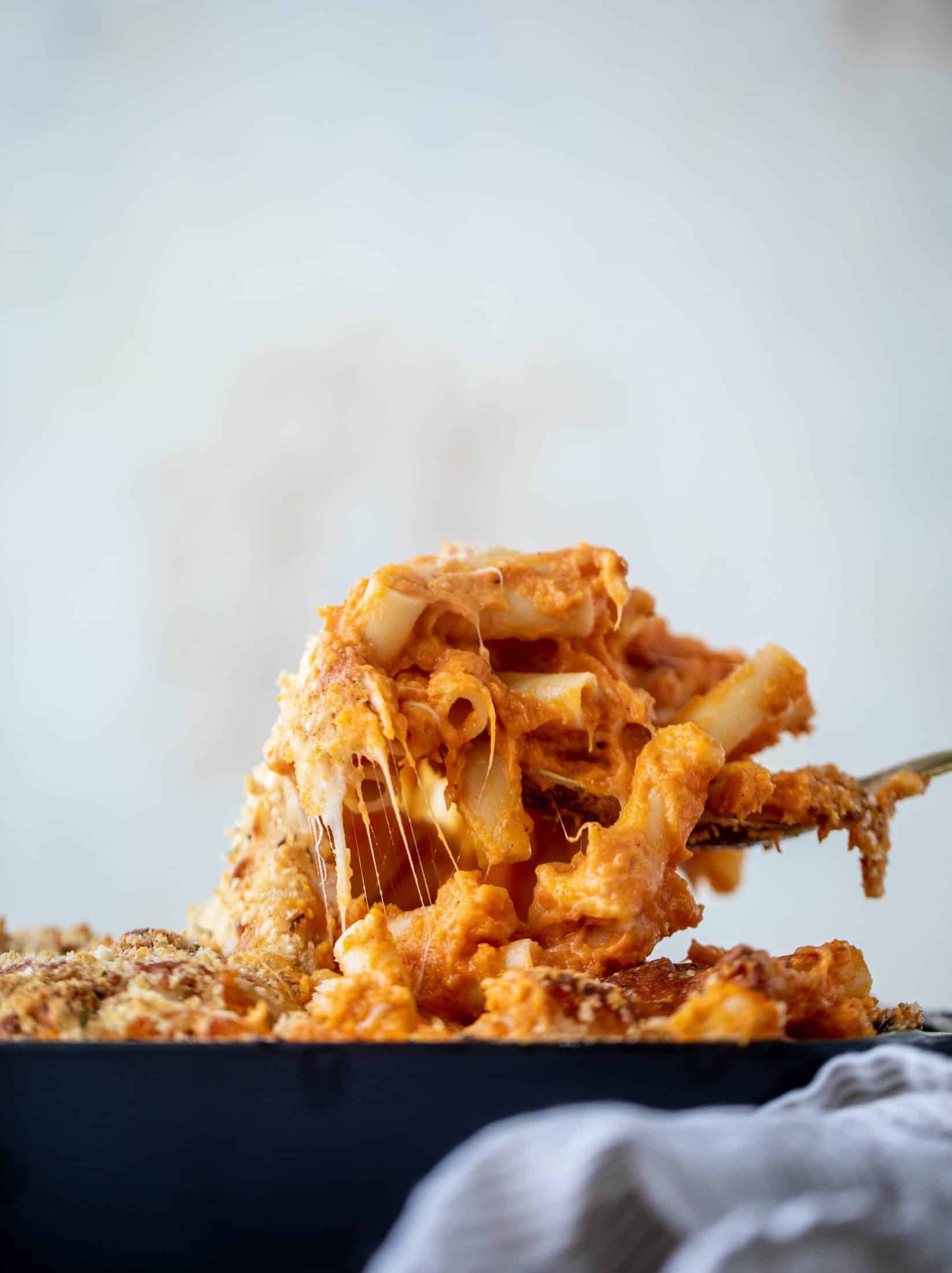 Butternut squash baked ziti is the ultimate comfort food! Squash, fire roasted tomatoes, parmesan and mozzarella make the best sauce ever.