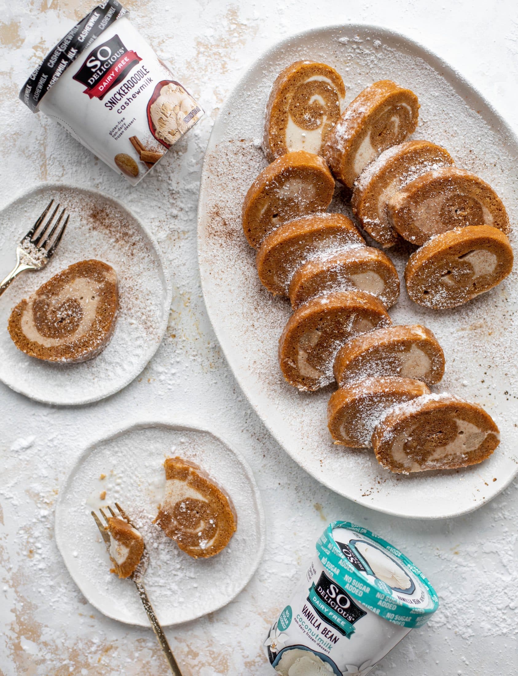 This frozen pumpkin roll is a delicious twist on the classic! Ice cream or non-dairy dessert is spread inside a classic pumpkin roll and serve frozen!