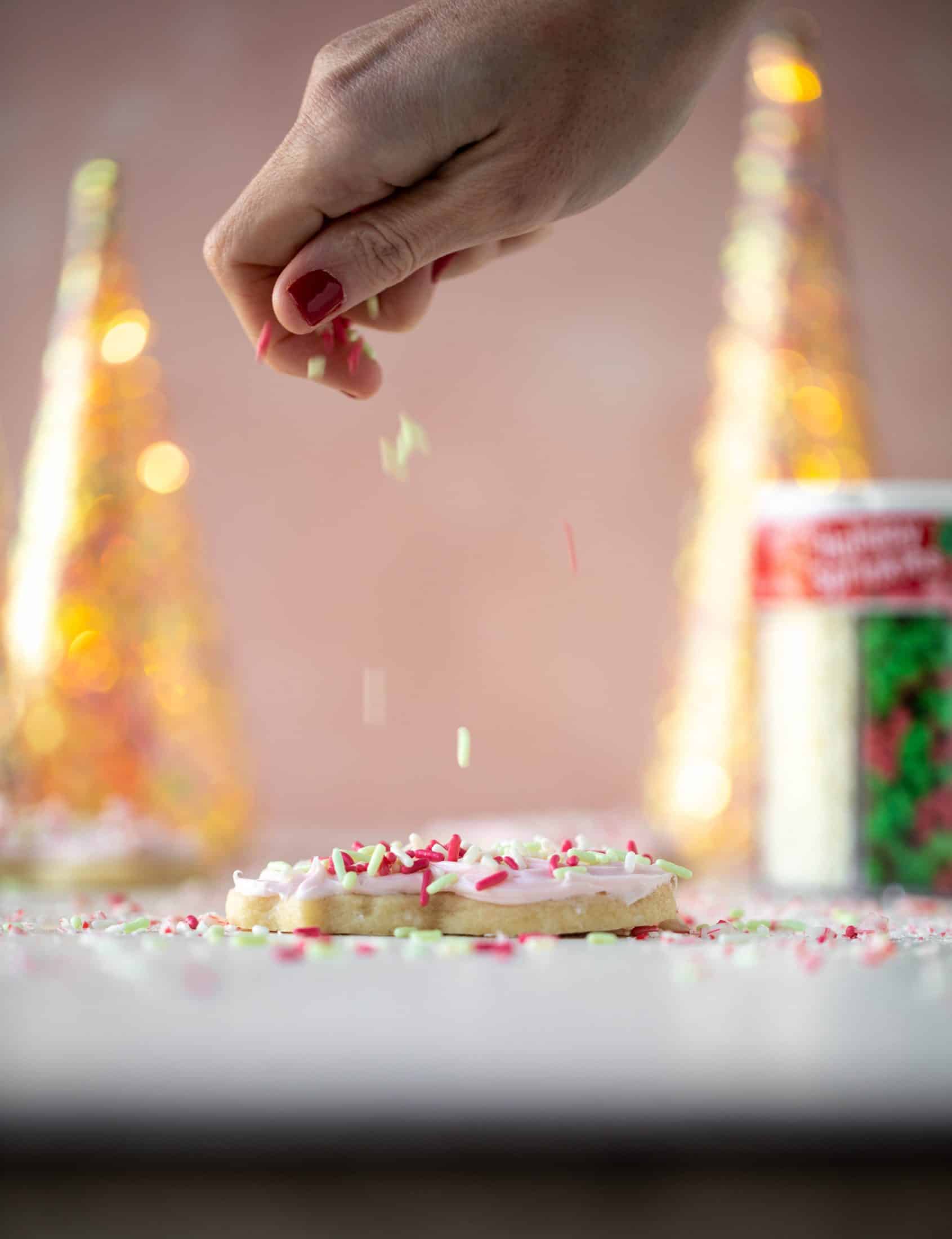 Pink peppermint sugar cookies are classic vanilla cut out cookies topped with peppermint cream cheese frosting. They are delicious! 