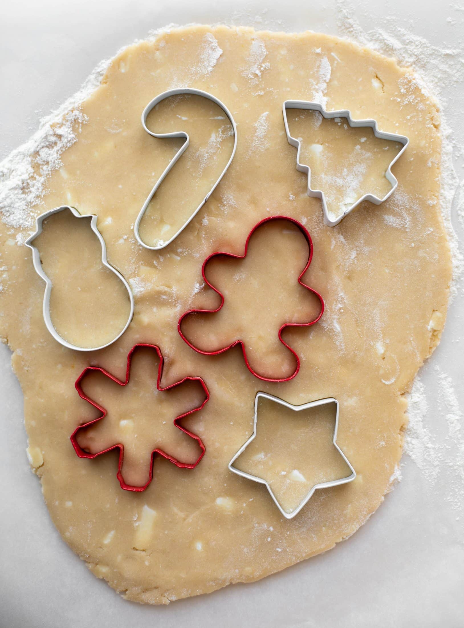 Pink peppermint sugar cookies are classic vanilla cut out cookies topped with peppermint cream cheese frosting. They are delicious! 