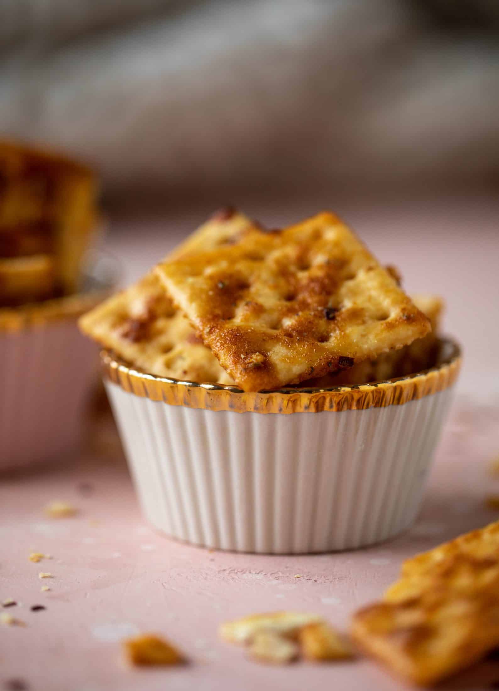 These super easy fire crackers are such a simple recipe to make! Bake the crackers with spice and butter for the perfect party snack.