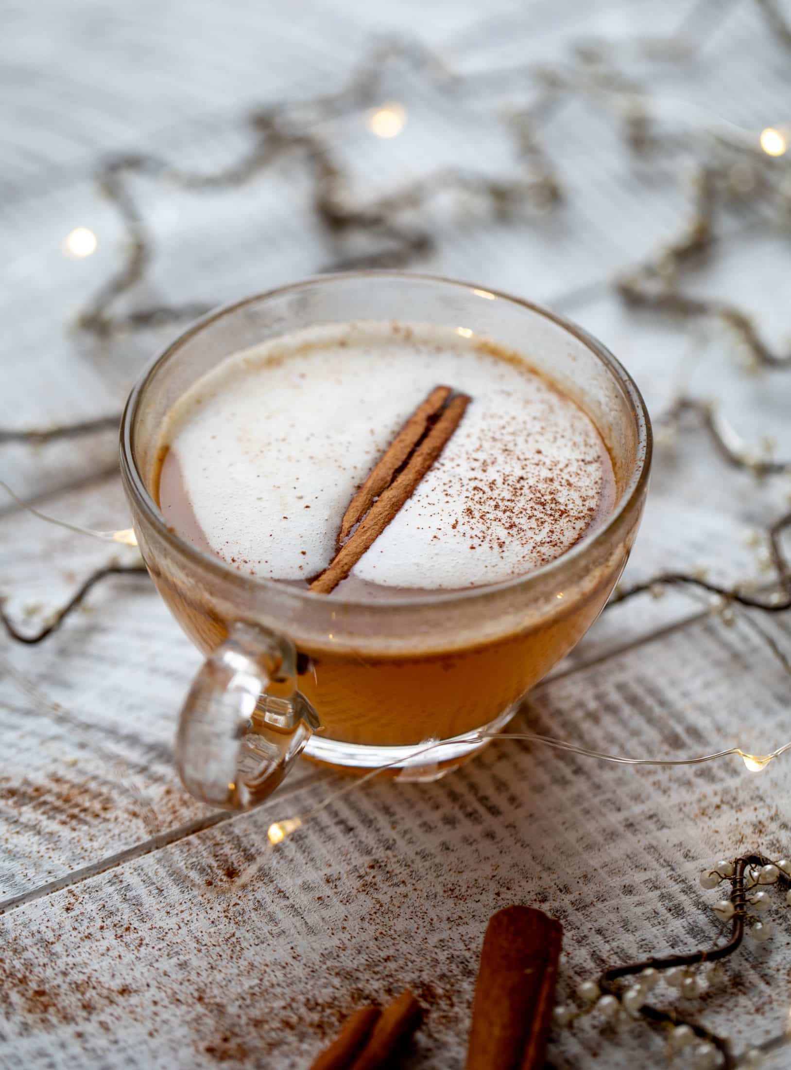 Hot buttered bourbon is a warming, spiced cozy drink that is perfect for chilly nights! Save batter in the fridge so you can have it whenever you'd like!