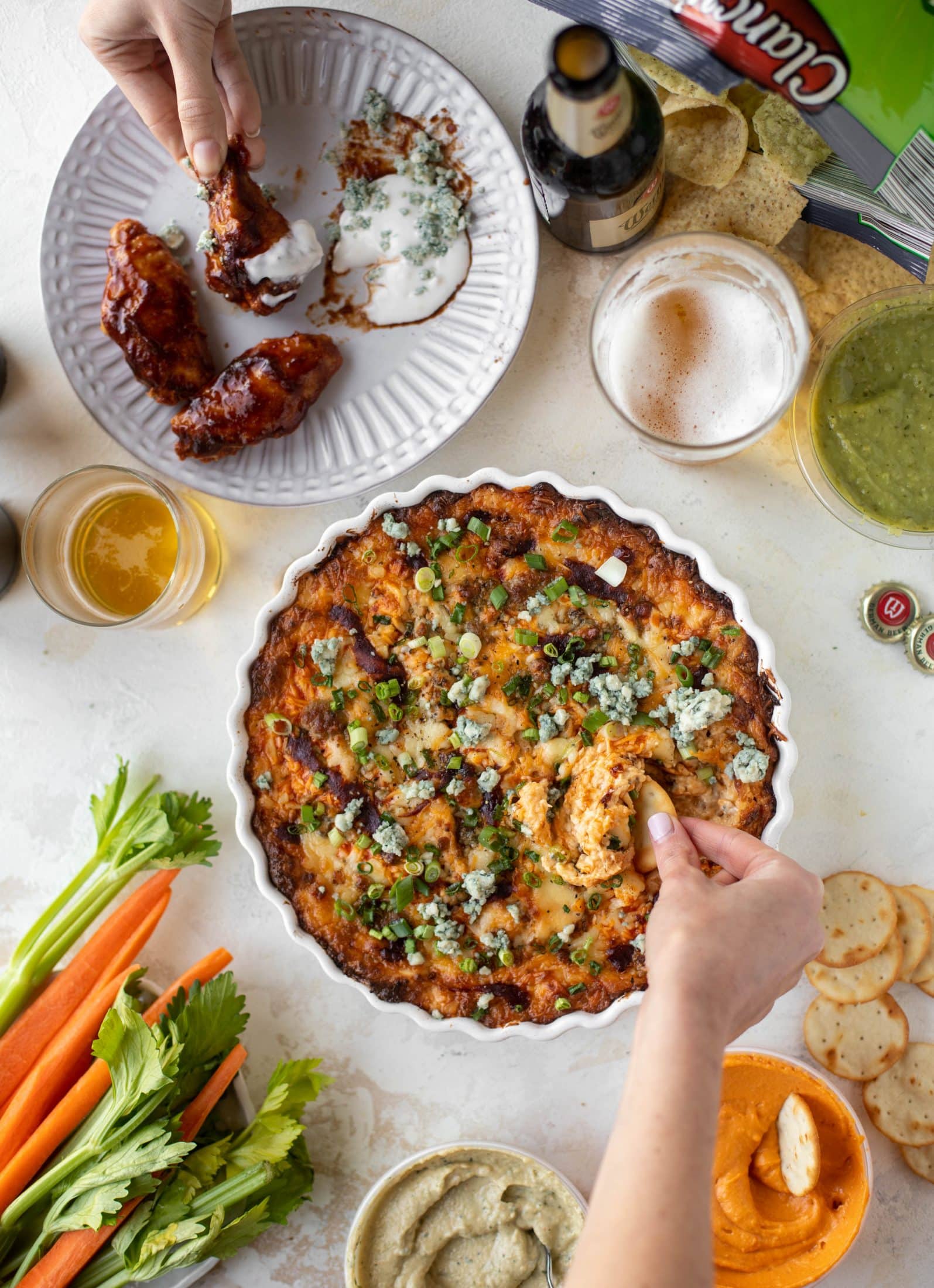 This loaded wing dip is full of buffalo wing sauce, BBQ sauce, honey mustard, ranch, blue cheese and tons of cheddar. All the flavors!