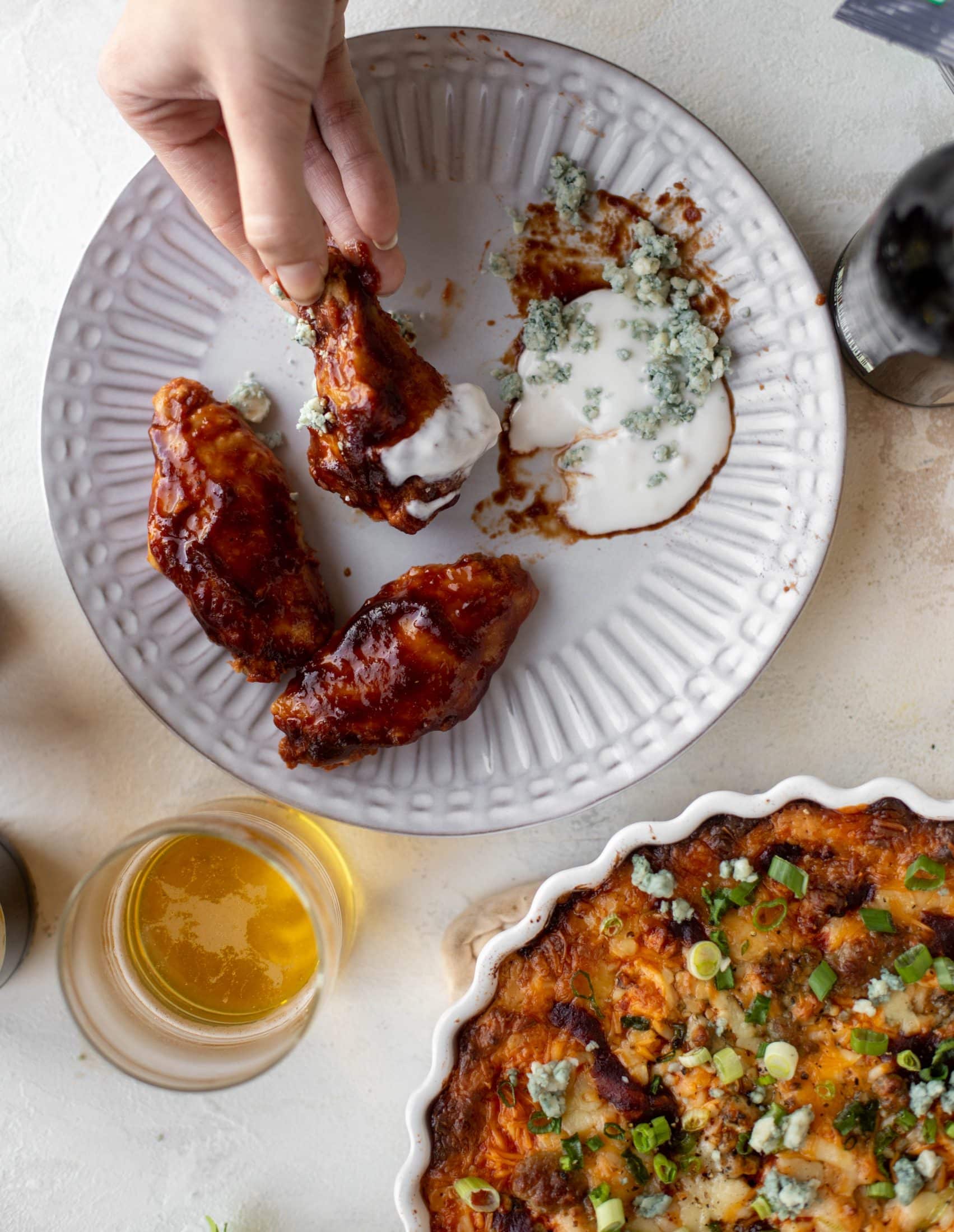 This loaded wing dip is full of buffalo wing sauce, BBQ sauce, honey mustard, ranch, blue cheese and tons of cheddar. All the flavors!