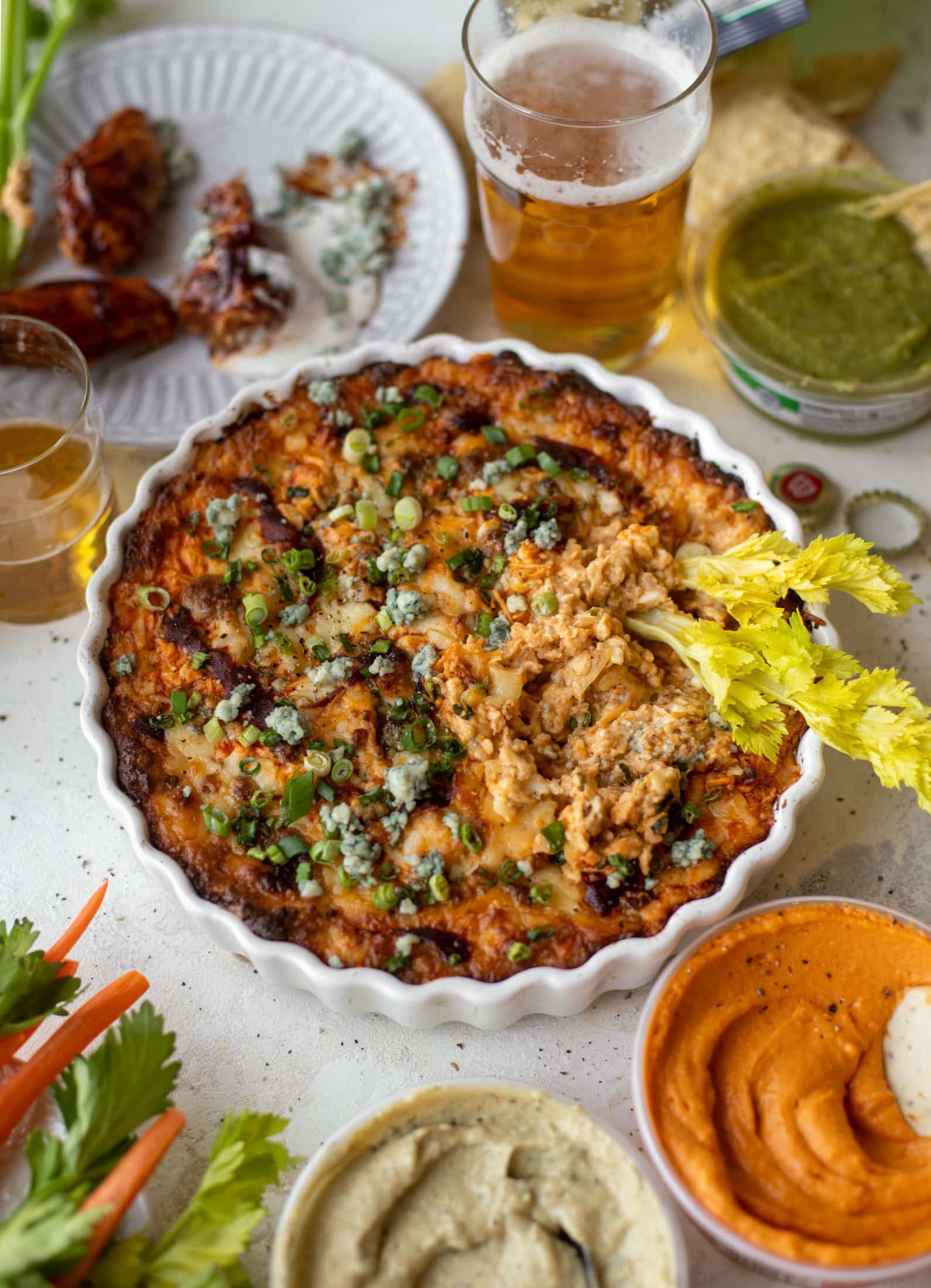 This loaded wing dip is full of buffalo wing sauce, BBQ sauce, honey mustard, ranch, blue cheese and tons of cheddar. All the flavors!