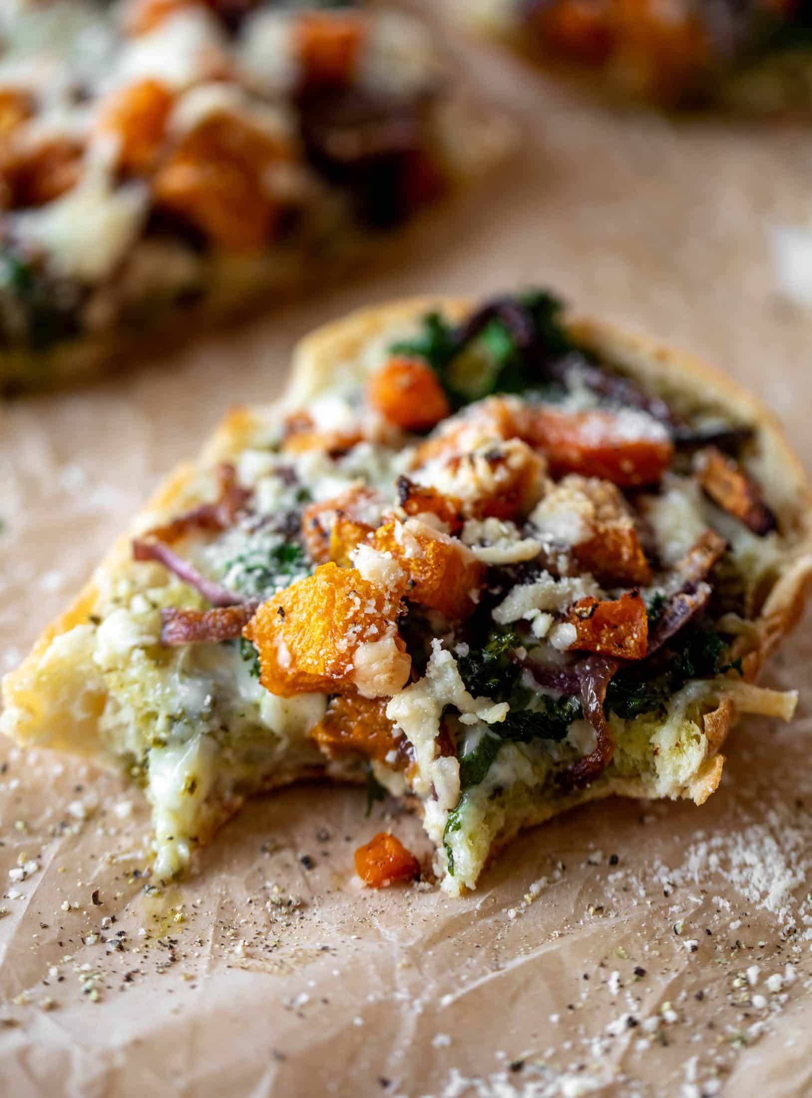 These butternut squash french breads have so much flavor. Pesto, caramelized onions, kale, roasted butternut and tons of fontina cheese. Delicious! 