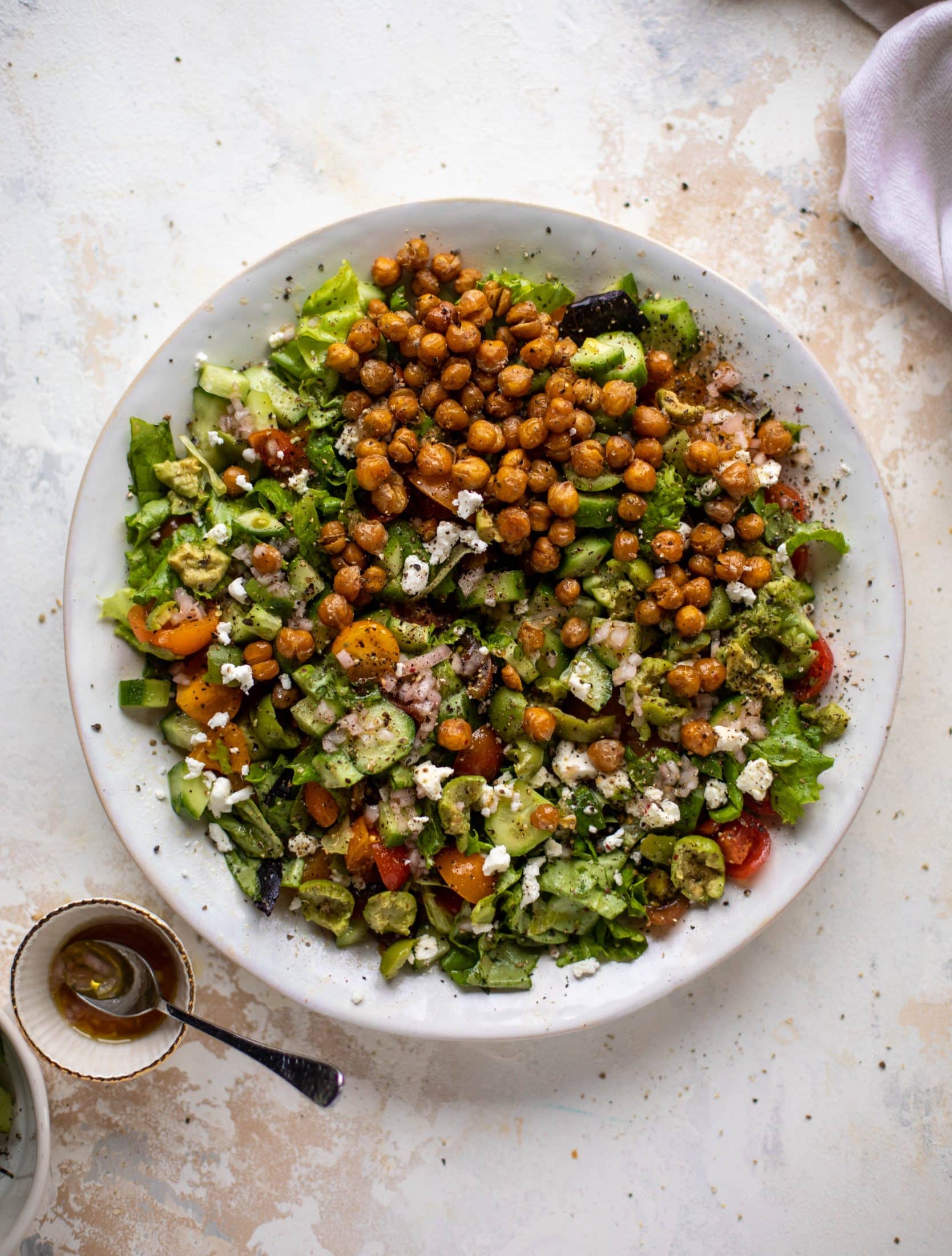 This crispy chickpea chopped salad is super simple and loaded with flavor. It's an incredible side or starter and a huge crowd pleaser!
