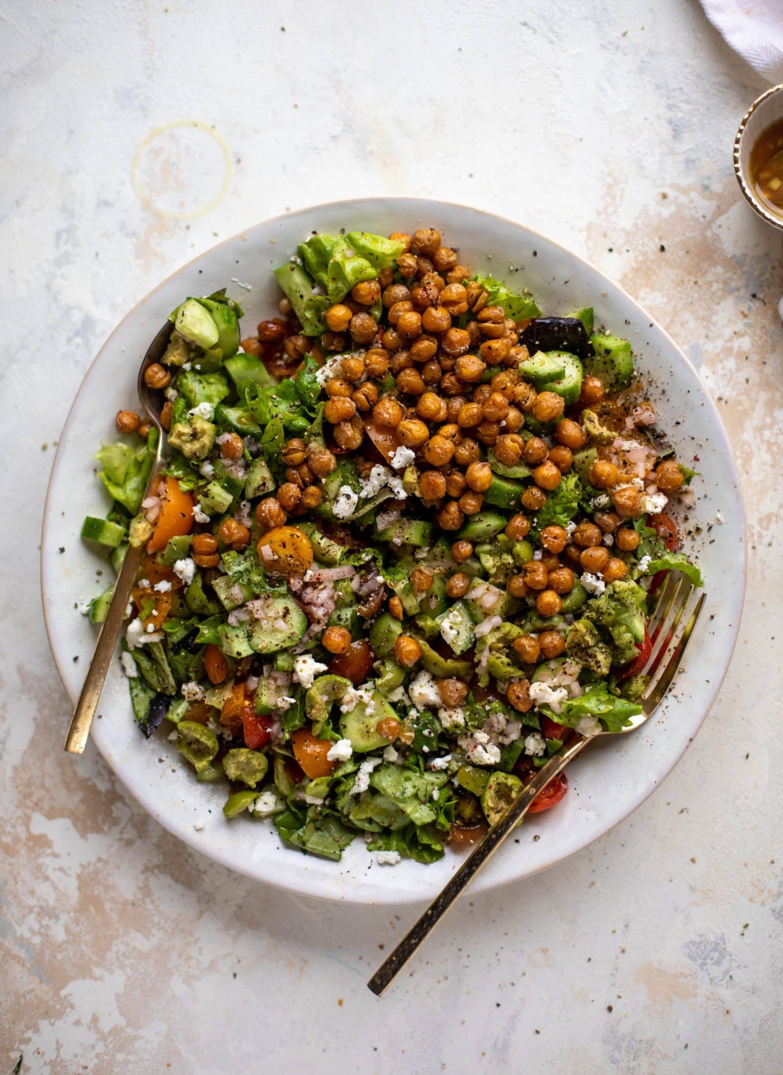 This crispy chickpea chopped salad is super simple and loaded with flavor. It's an incredible side or starter and a huge crowd pleaser!