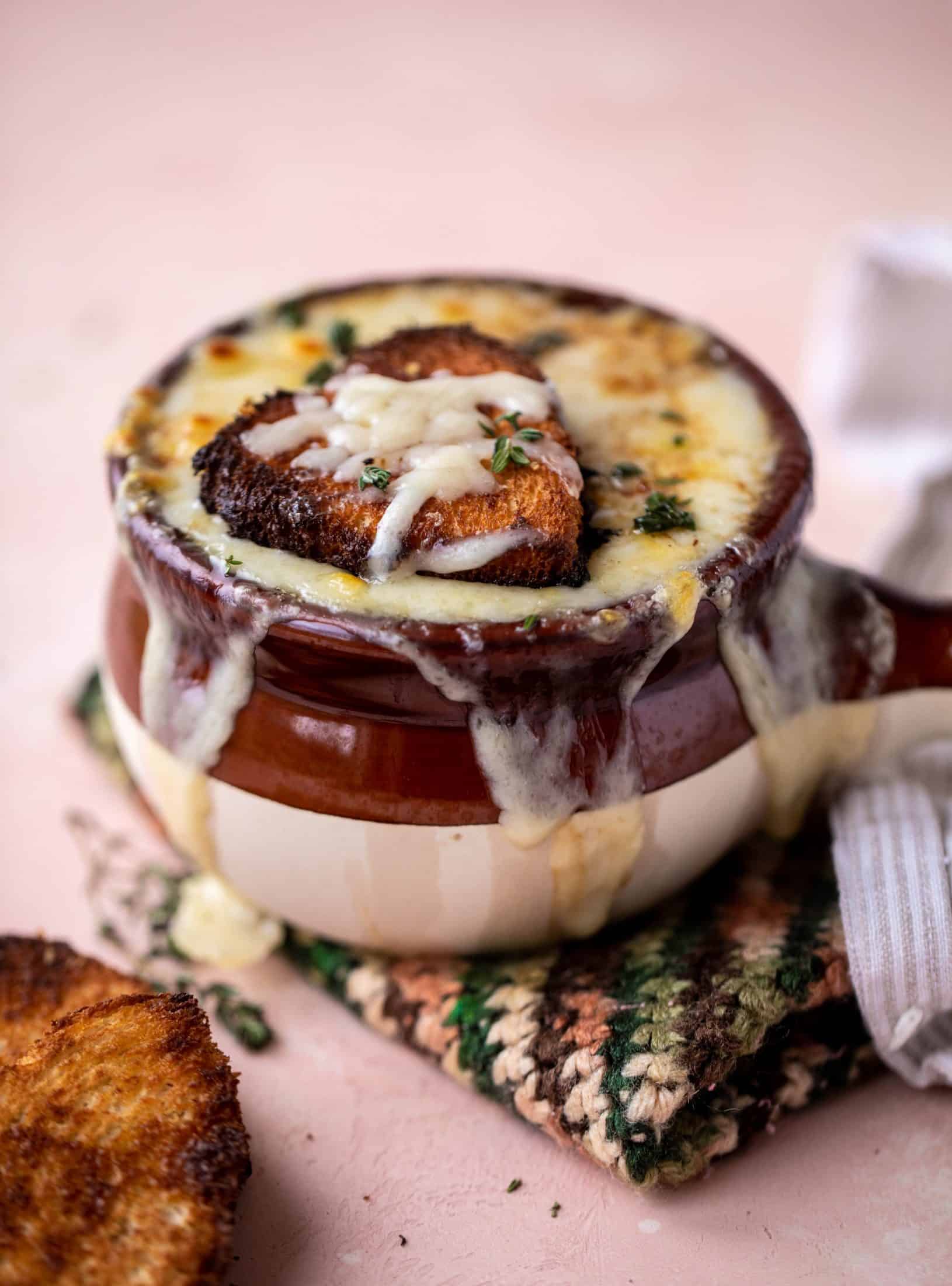 My favorite french onion soup starts with bourbon caramelized onions! Adorable heart croutons and tons of gruyere take it over the top.